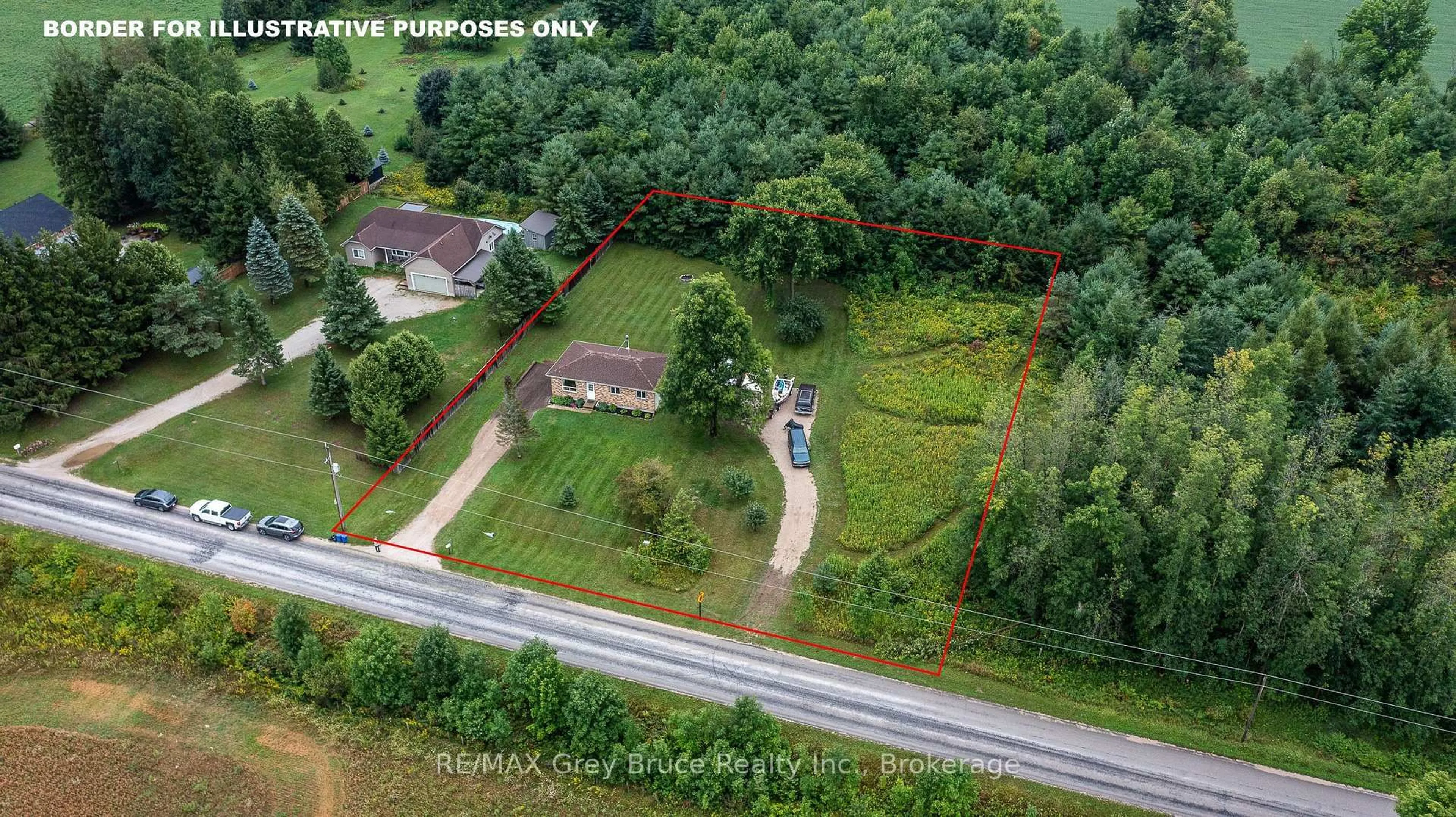A pic from outside/outdoor area/front of a property/back of a property/a pic from drone, forest/trees view for 101530 Side Road 9, Georgian Bluffs Ontario N0H 2N0