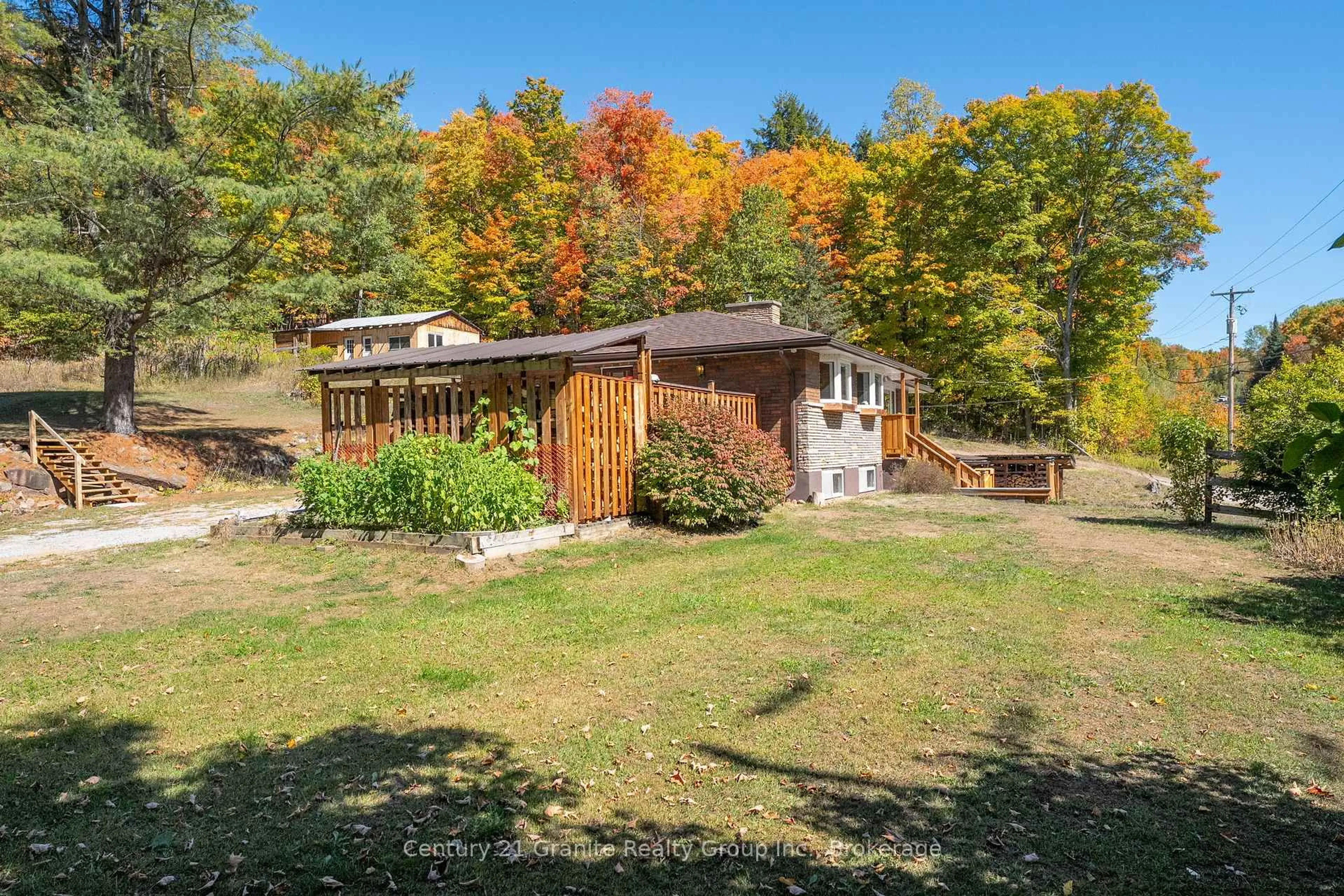 A pic from outside/outdoor area/front of a property/back of a property/a pic from drone, unknown for 1395 County 21 Highway, Minden Hills Ontario K0M 2K0