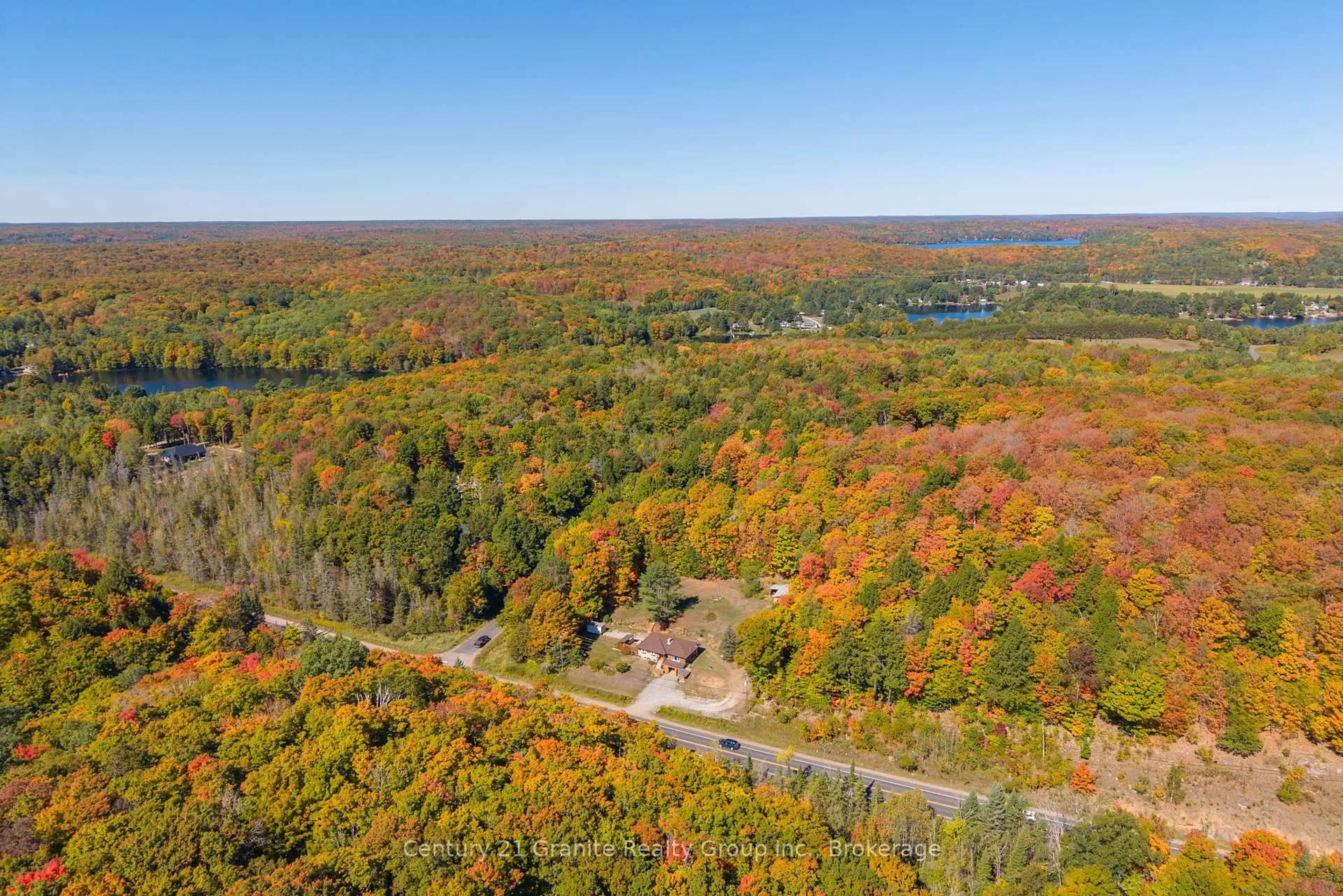 A pic from outside/outdoor area/front of a property/back of a property/a pic from drone, forest/trees view for 1395 County 21 Highway, Minden Hills Ontario K0M 2K0