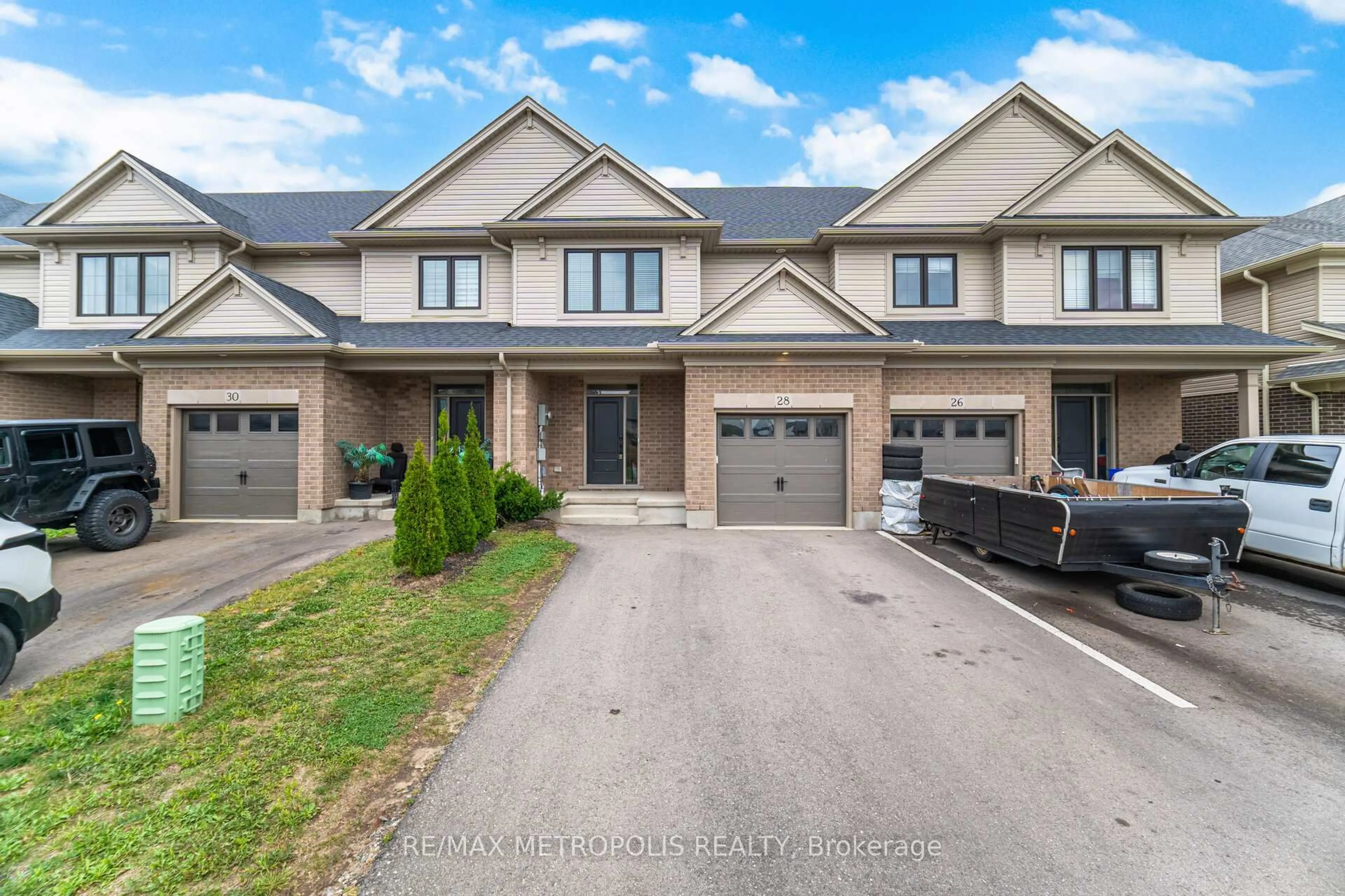 A pic from outside/outdoor area/front of a property/back of a property/a pic from drone, street for 28 Keba Cres, Tillsonburg Ontario N4G 0K7