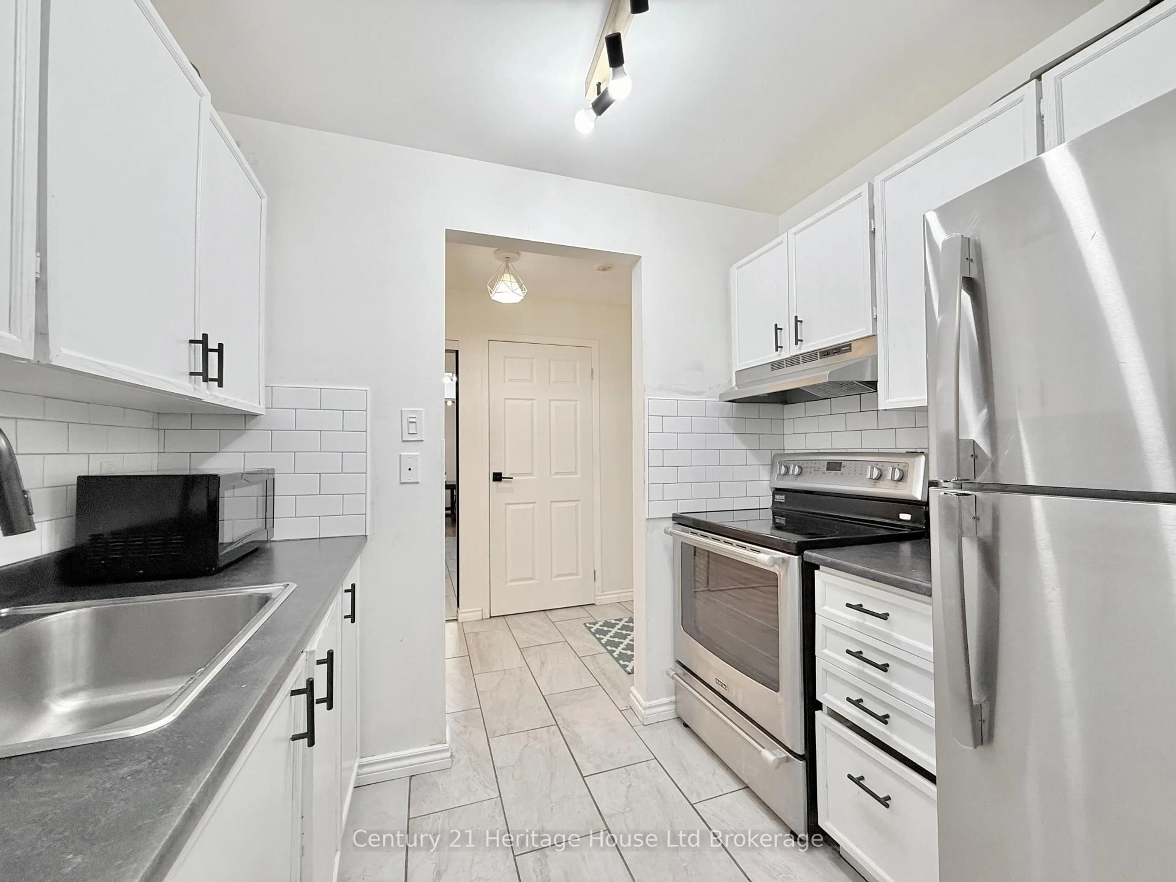 Standard kitchen, ceramic/tile floor for 737 DEVERON Cres #217, London South Ontario N5Z 4X9