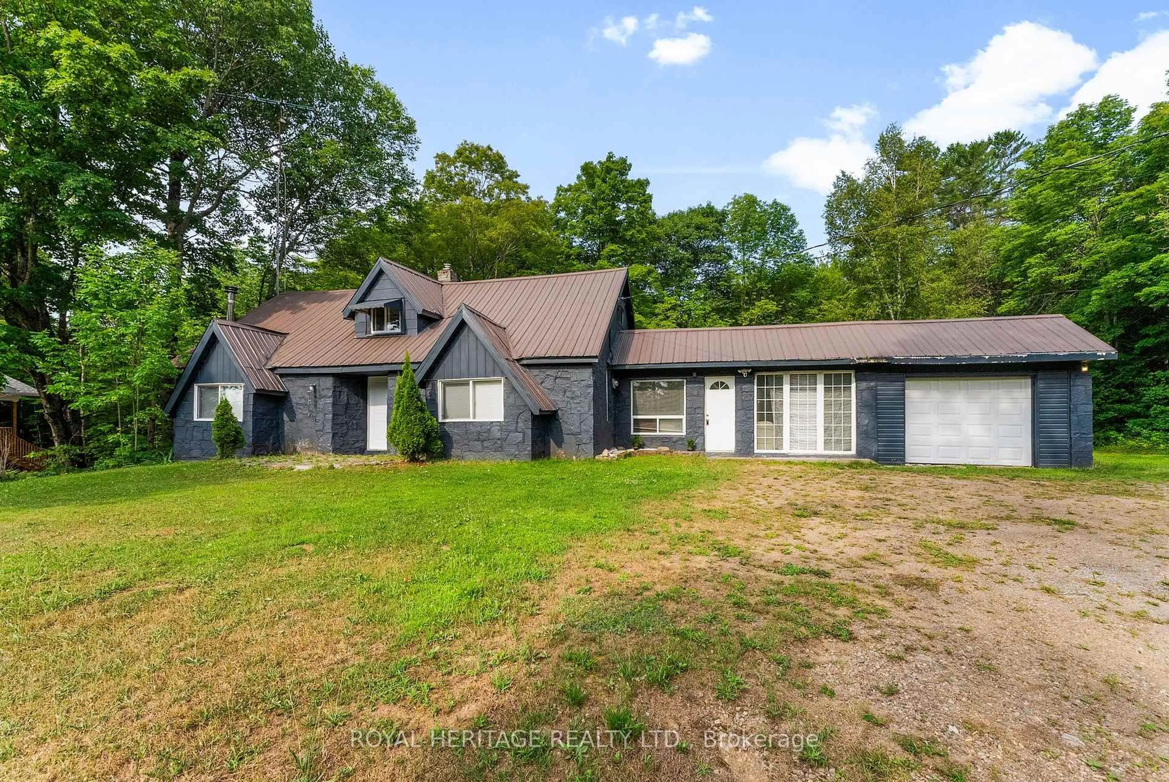 A pic from outside/outdoor area/front of a property/back of a property/a pic from drone, street for 17415 35 Highway, Algonquin Highlands Ontario K0M 2K0