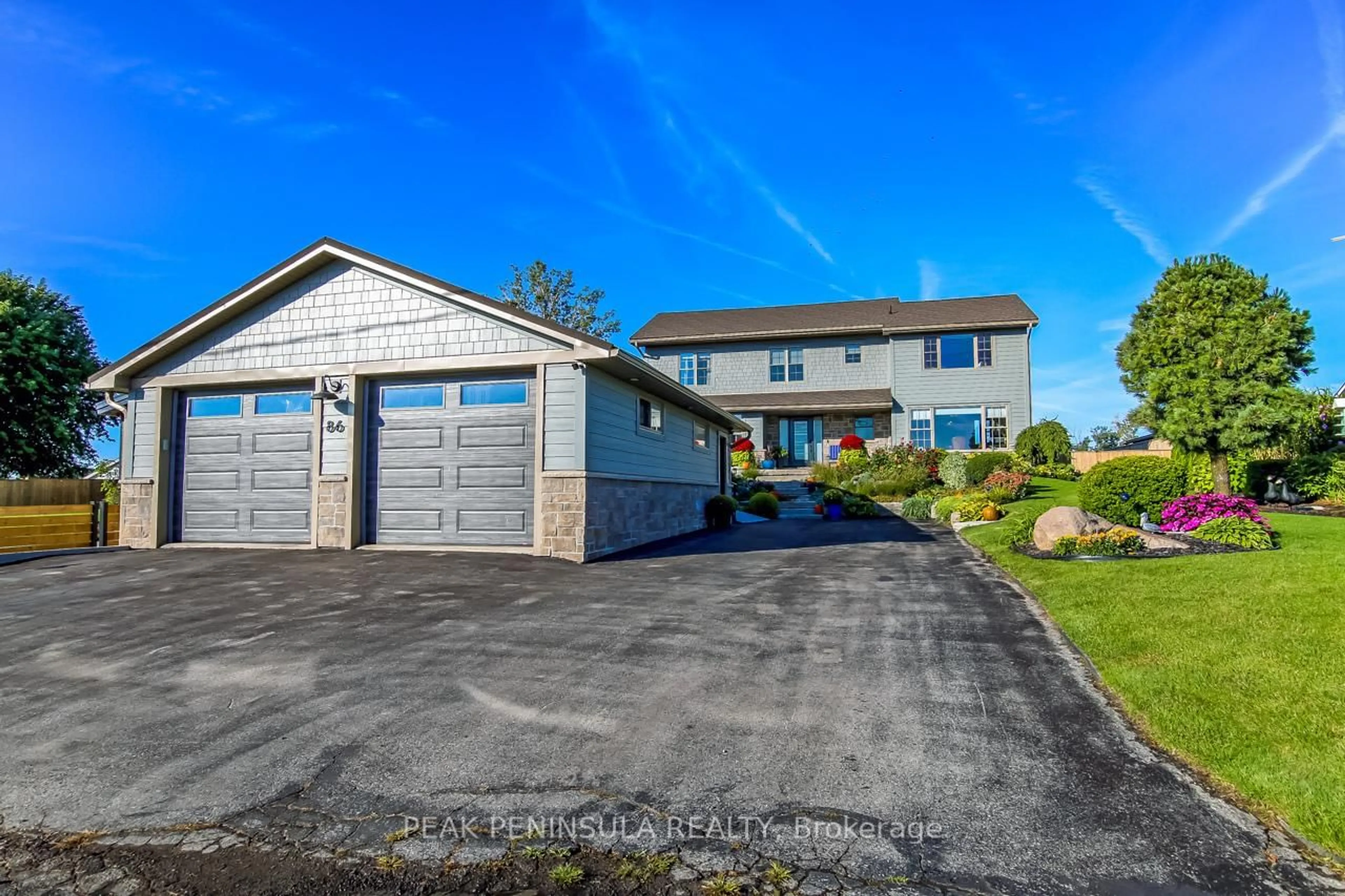 Home with vinyl exterior material, street for 86 Old Cut Blvd, Norfolk Ontario N0E 1M0