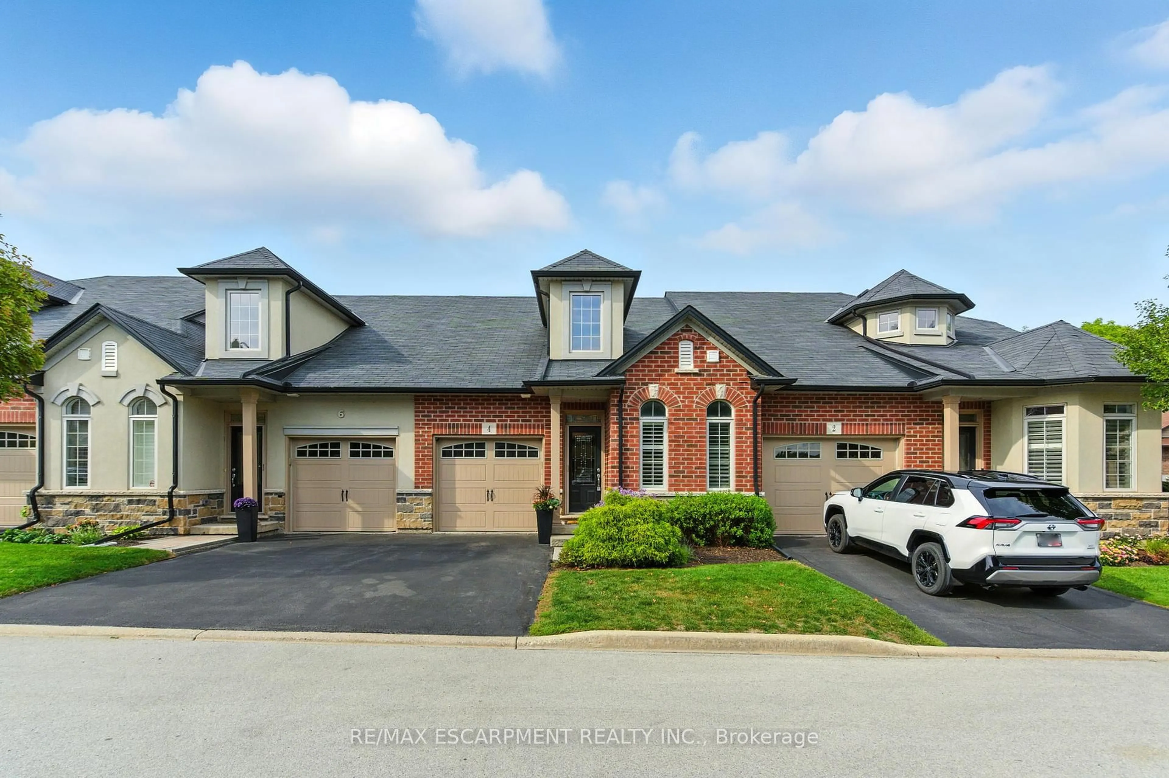 Home with brick exterior material, street for 4 Burgundy Grve, Hamilton Ontario L8K 0E7