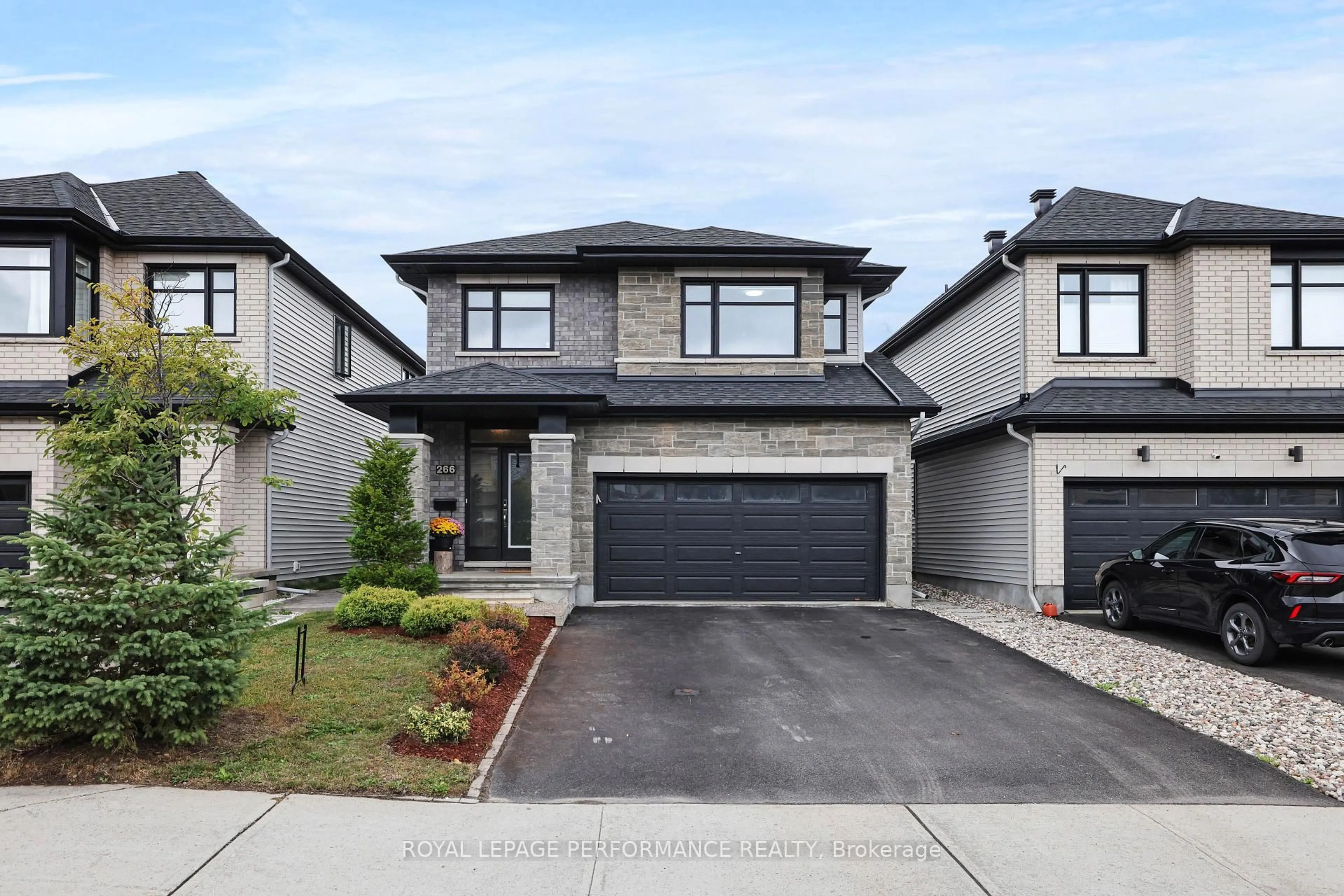 Home with brick exterior material, street for 266 SHINLEAF Cres, Ottawa Ontario K1W 0J2