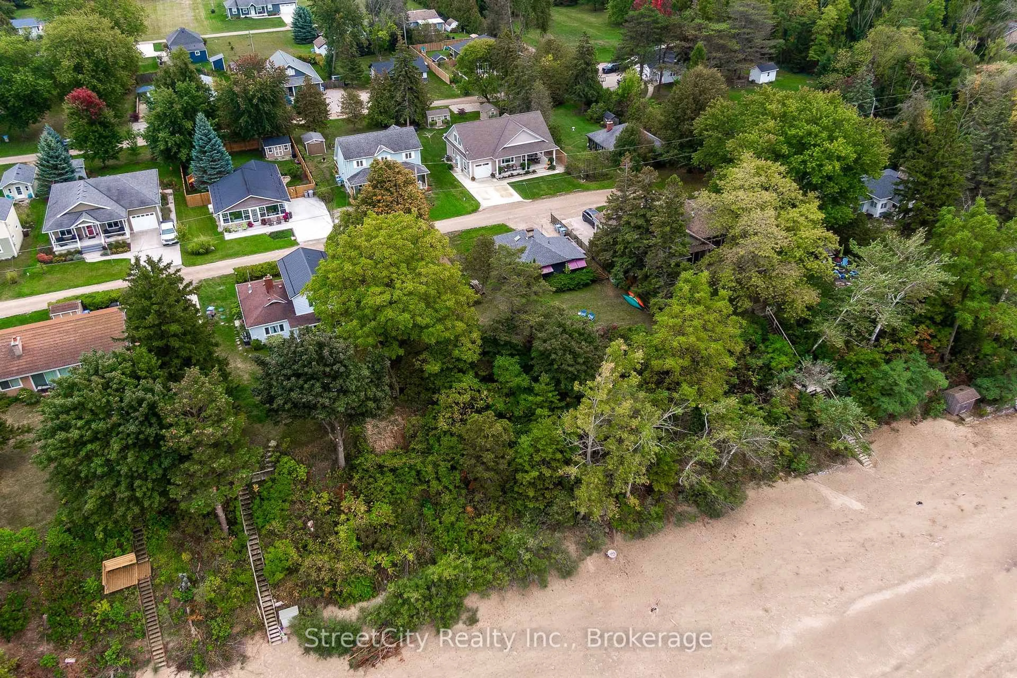 A pic from outside/outdoor area/front of a property/back of a property/a pic from drone, water/lake/river/ocean view for 71214 Anne St, Bluewater Ontario N0M 1N0
