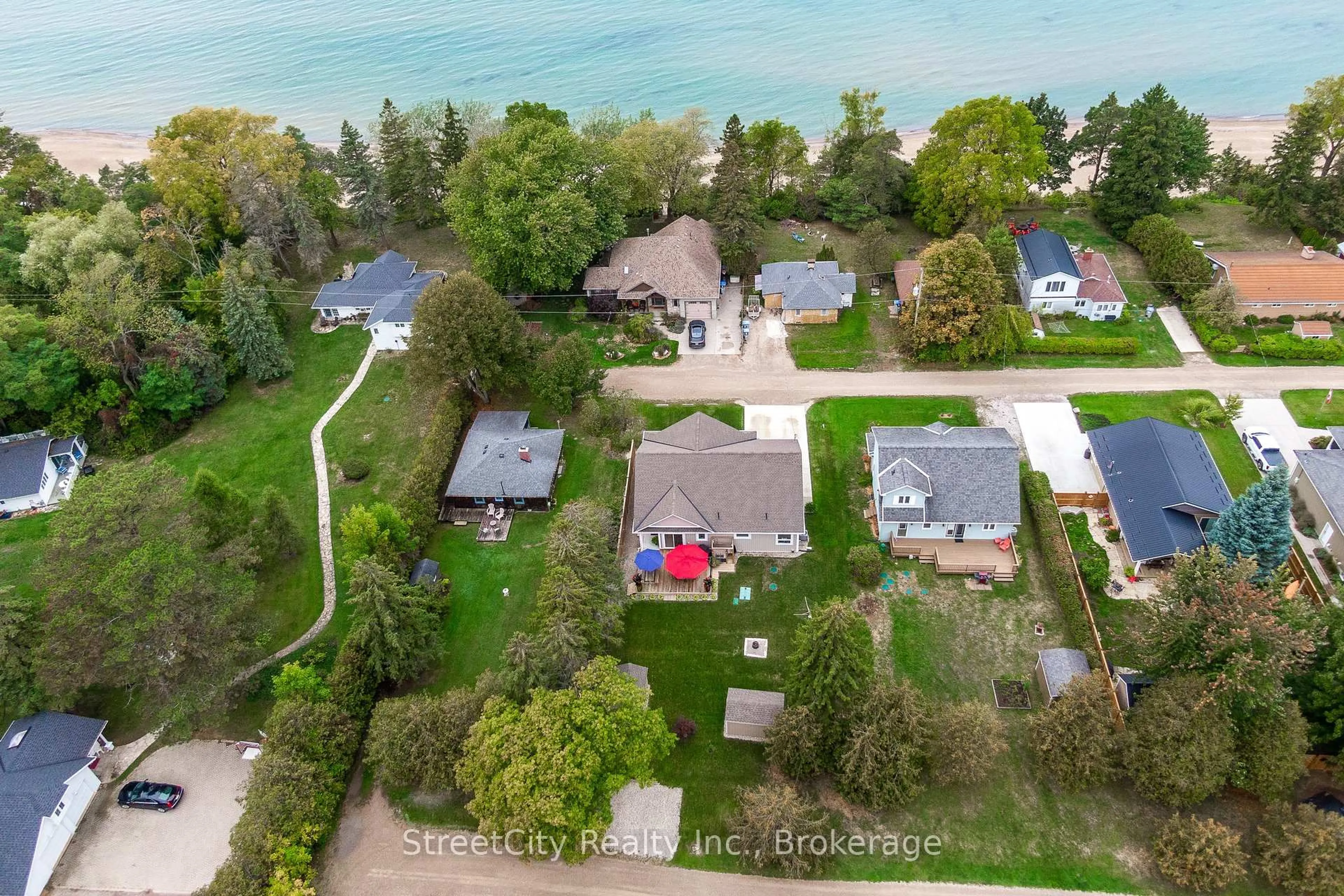 A pic from outside/outdoor area/front of a property/back of a property/a pic from drone, water/lake/river/ocean view for 71214 Anne St, Bluewater Ontario N0M 1N0