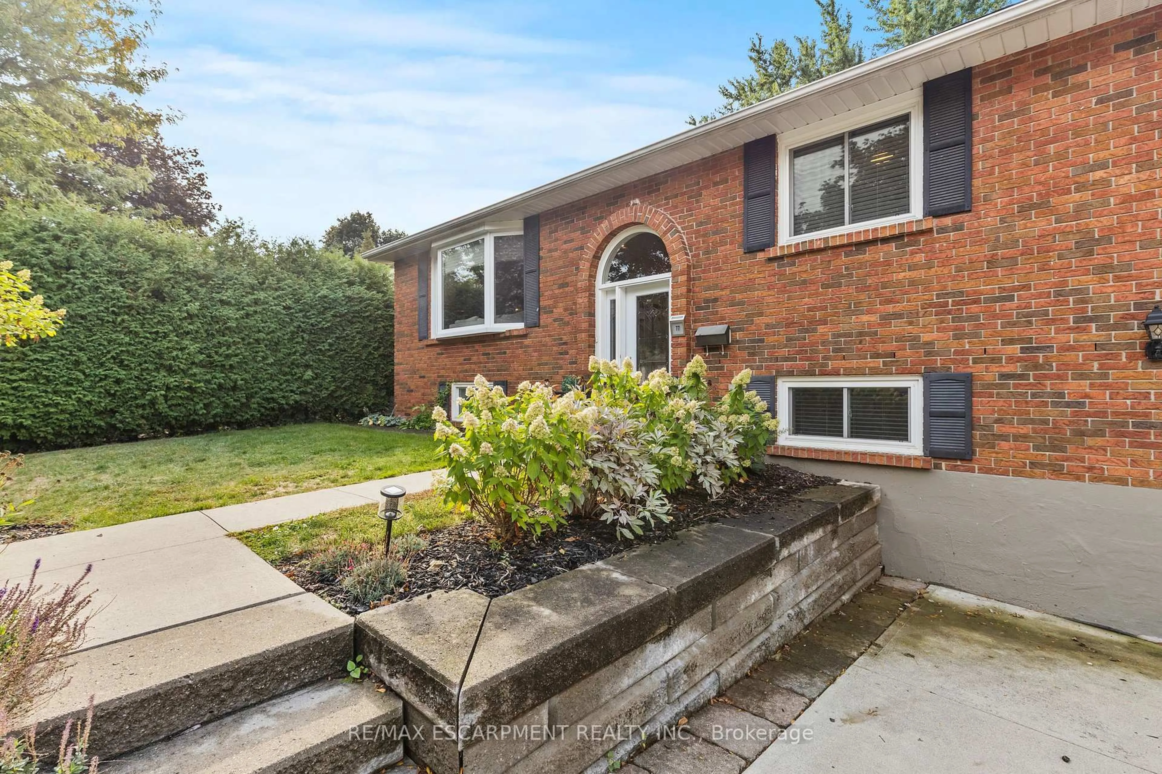 Home with brick exterior material, street for 77 Debora Dr, Grimsby Ontario L3M 4L3