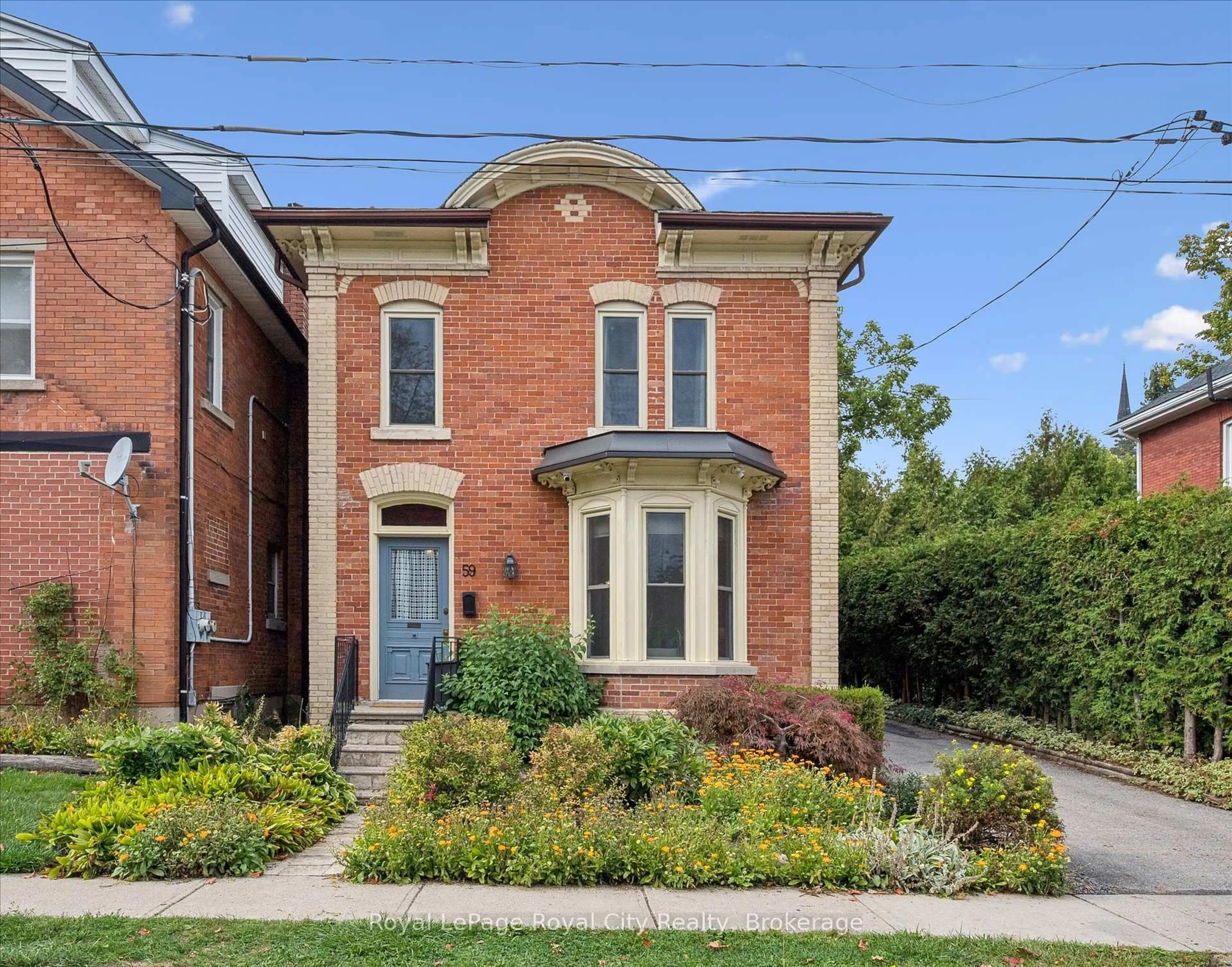 Home with brick exterior material, street for 59 Kent St, Guelph Ontario N1H 3B7