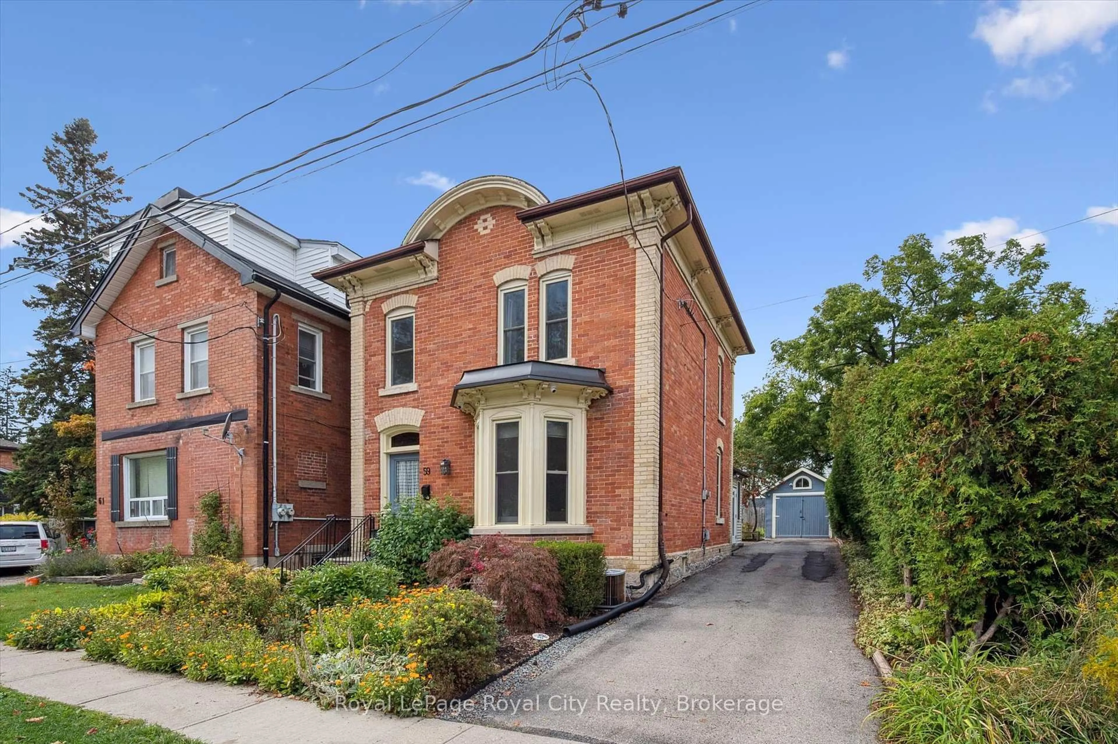 Home with brick exterior material, street for 59 Kent St, Guelph Ontario N1H 3B7
