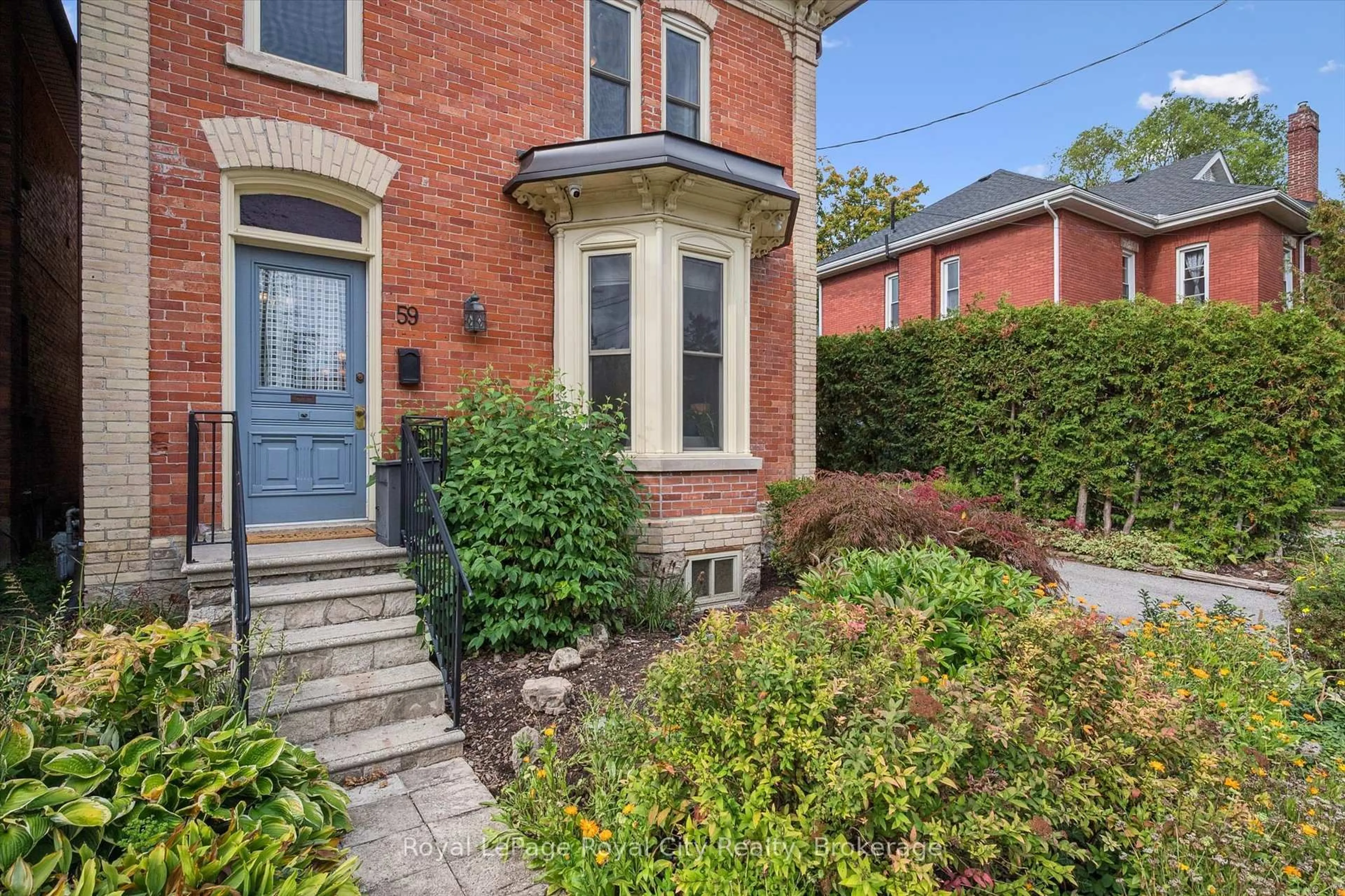 Home with brick exterior material, street for 59 Kent St, Guelph Ontario N1H 3B7