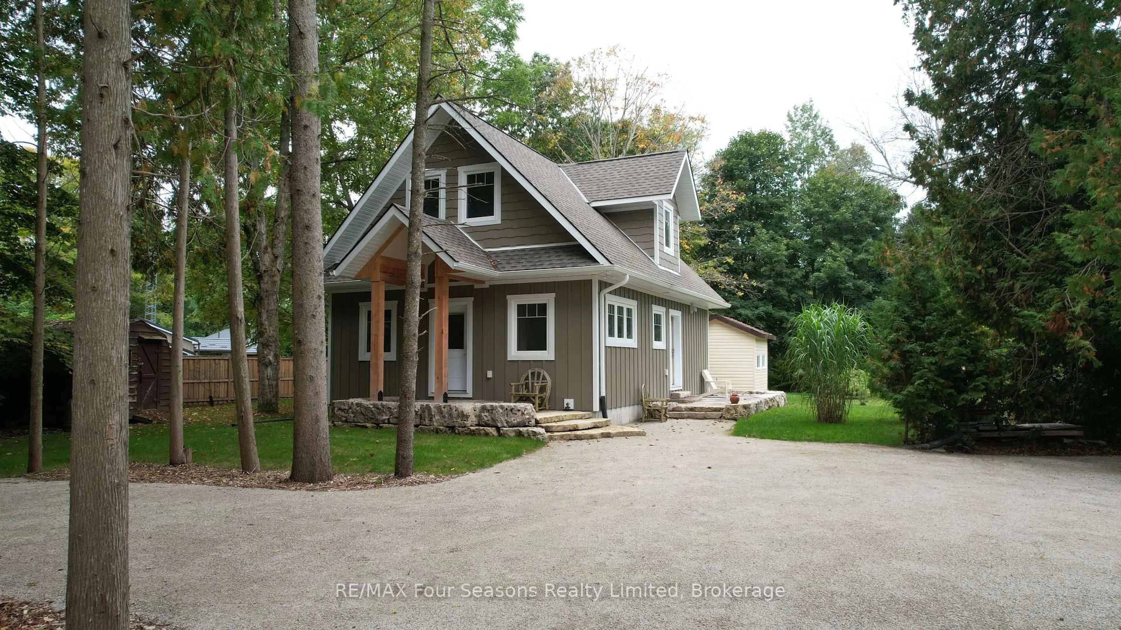 Home with vinyl exterior material, street for 457 Huron Rd, South Bruce Peninsula Ontario N0H 2T0