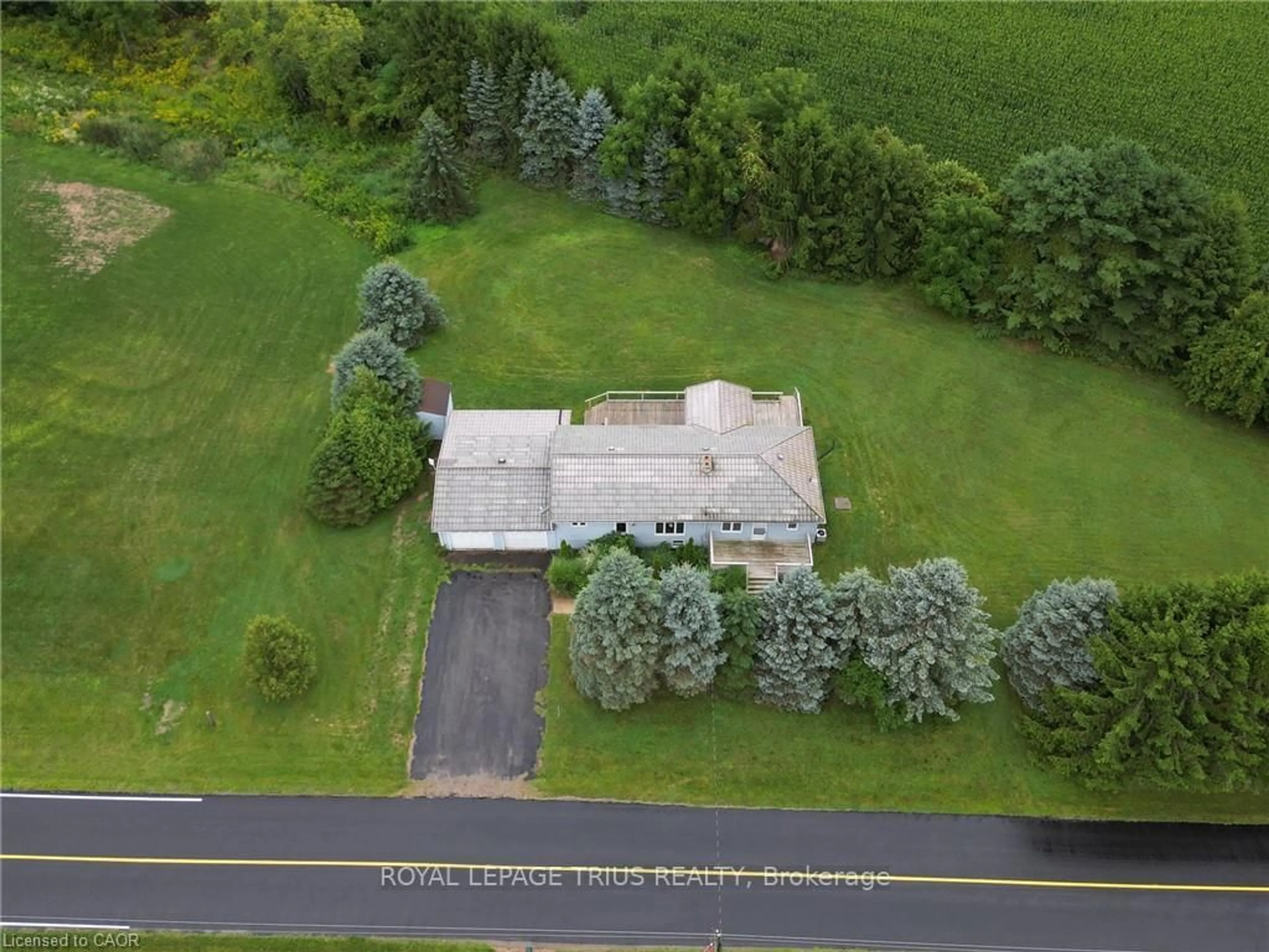 A pic from outside/outdoor area/front of a property/back of a property/a pic from drone, street for 35383 Lake Line, Southwold Ontario L5L 1J1