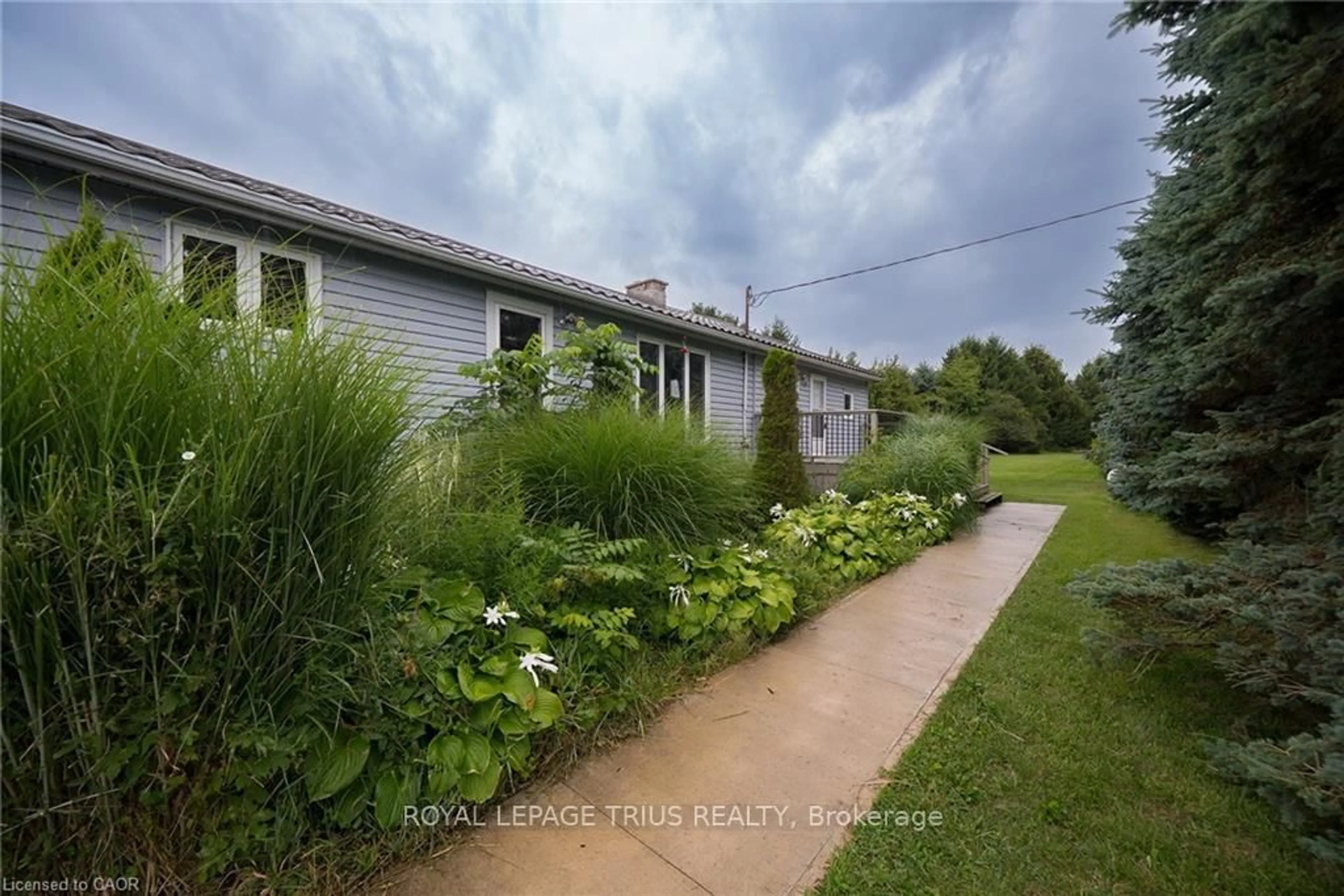A pic from outside/outdoor area/front of a property/back of a property/a pic from drone, street for 35383 Lake Line, Southwold Ontario L5L 1J1