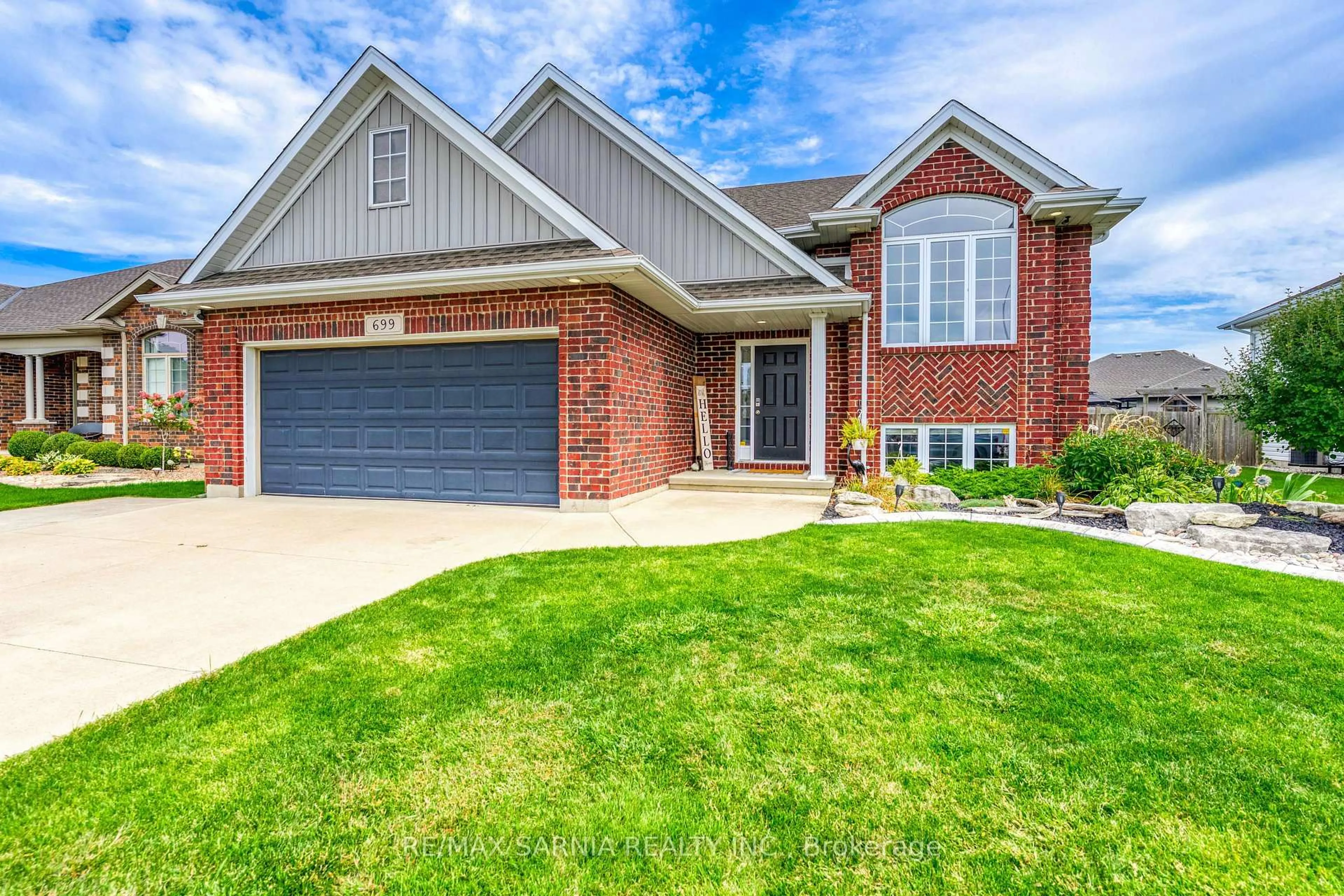 Home with brick exterior material, street for 699 BENTINCK Dr, St. Clair Ontario N0N 1G0
