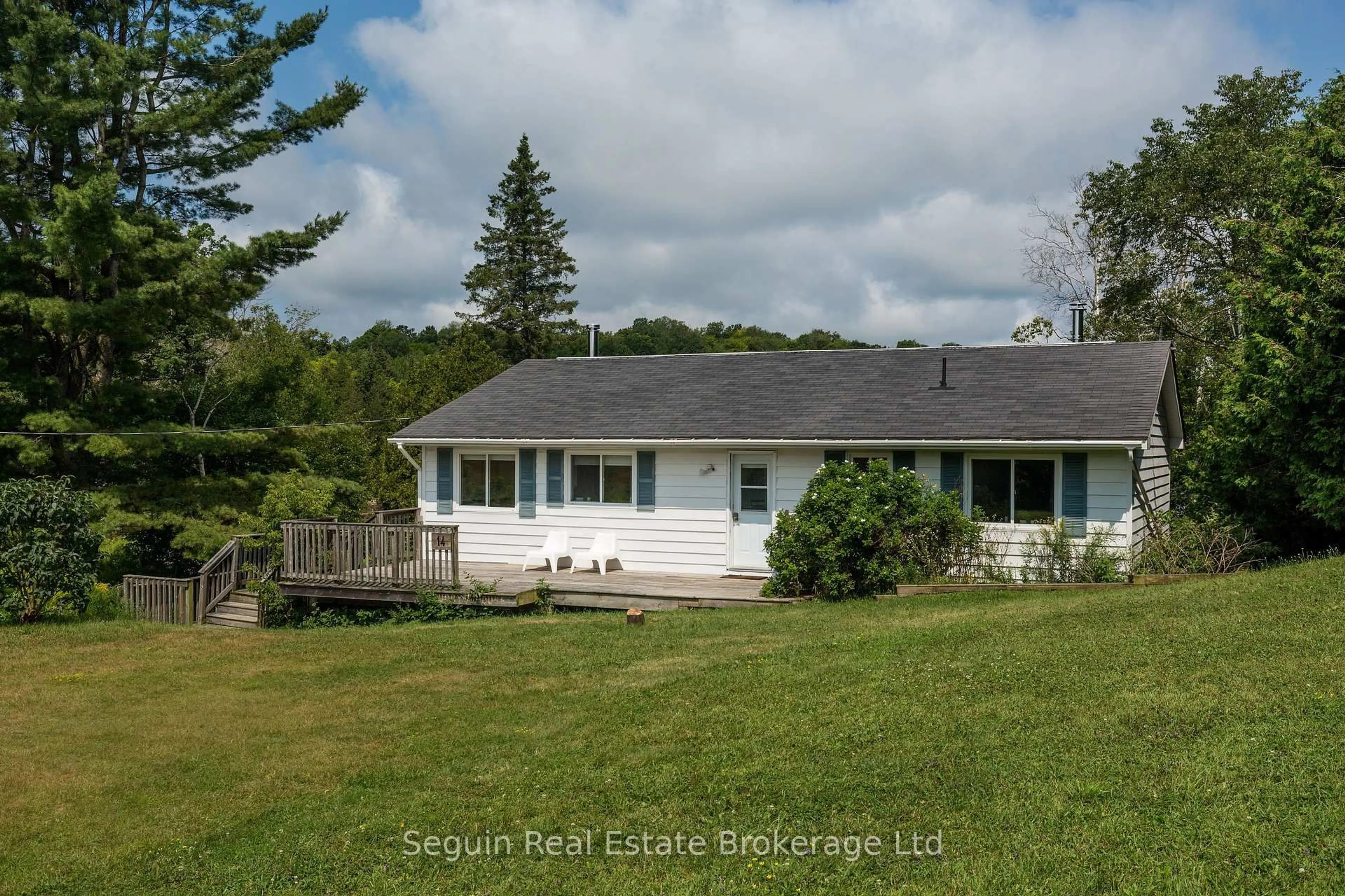 A pic from outside/outdoor area/front of a property/back of a property/a pic from drone, water/lake/river/ocean view for 14 Jordan Lane, Seguin Ontario P2A 0B2