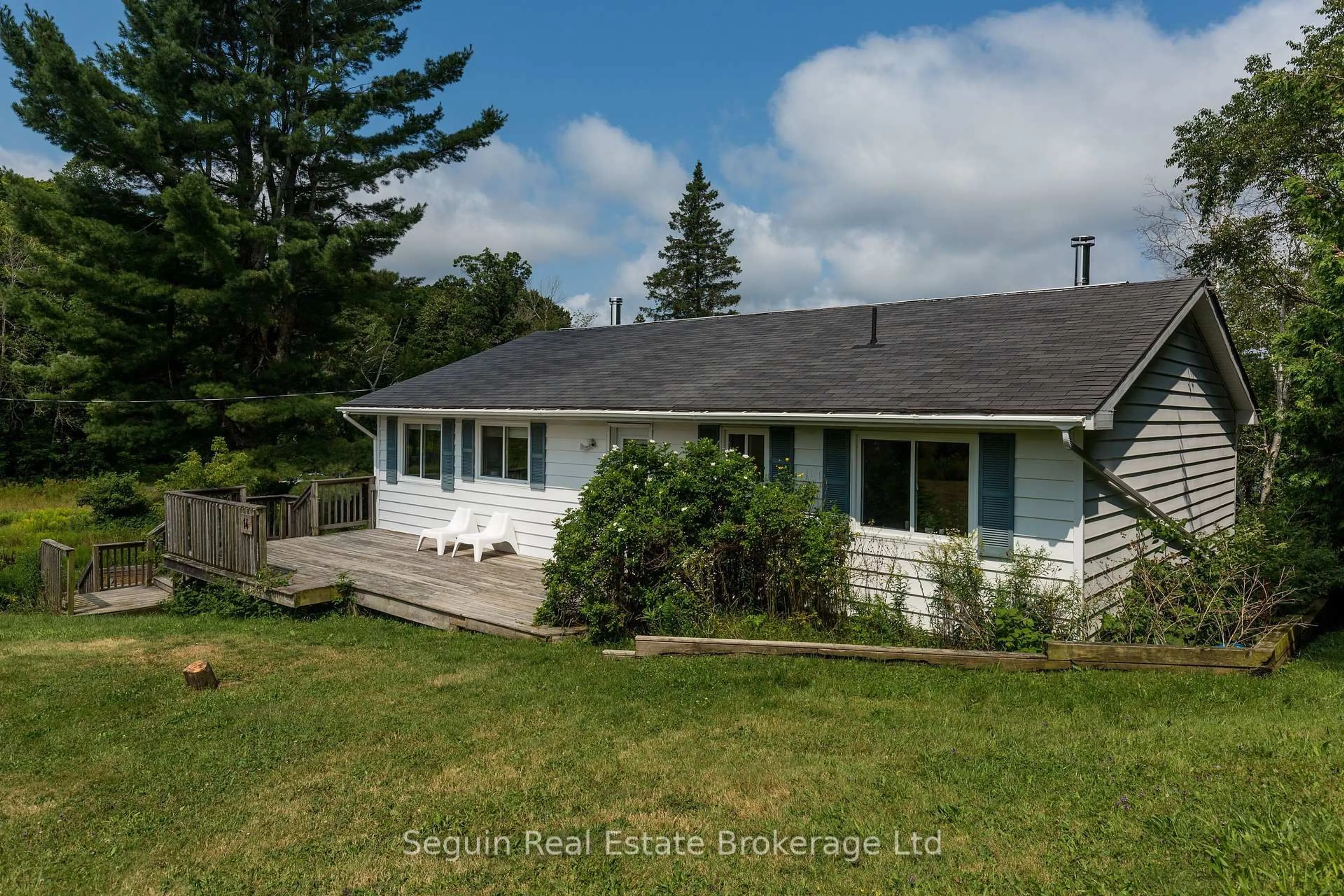 A pic from outside/outdoor area/front of a property/back of a property/a pic from drone, water/lake/river/ocean view for 14 Jordan Lane, Seguin Ontario P2A 0B2