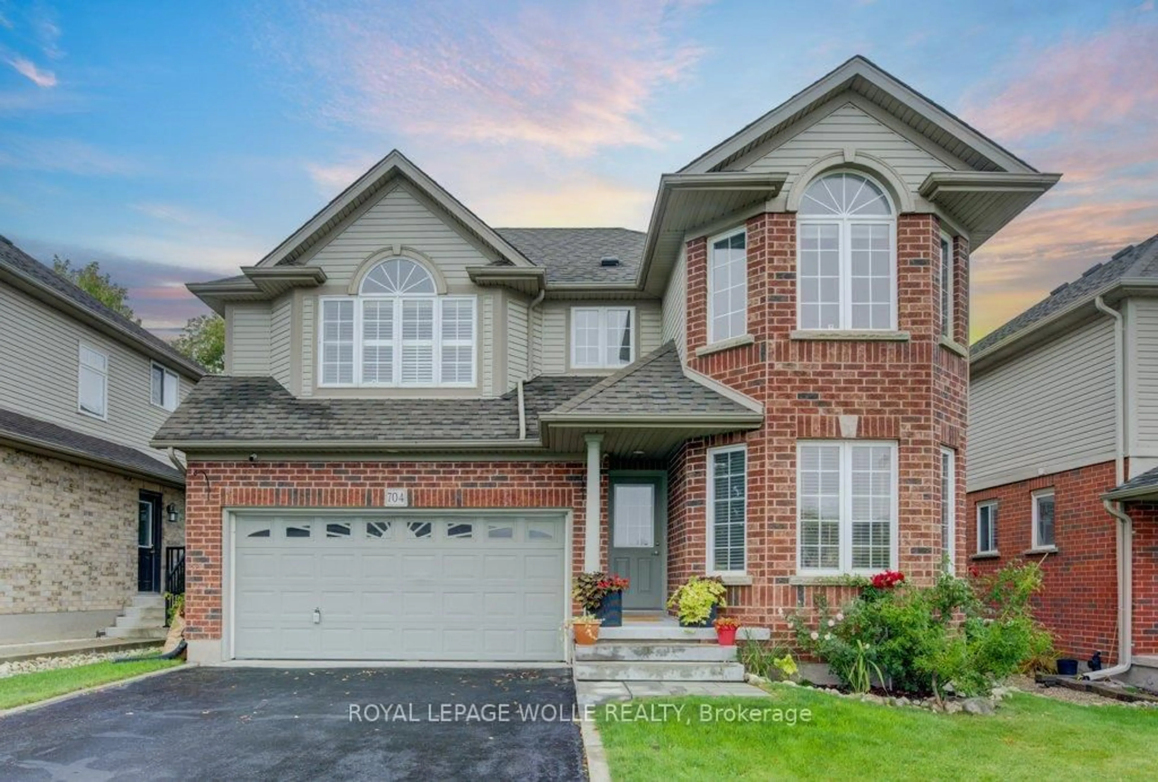 Home with brick exterior material, street for 704 Shediac Cres, Waterloo Ontario N2K 4H5