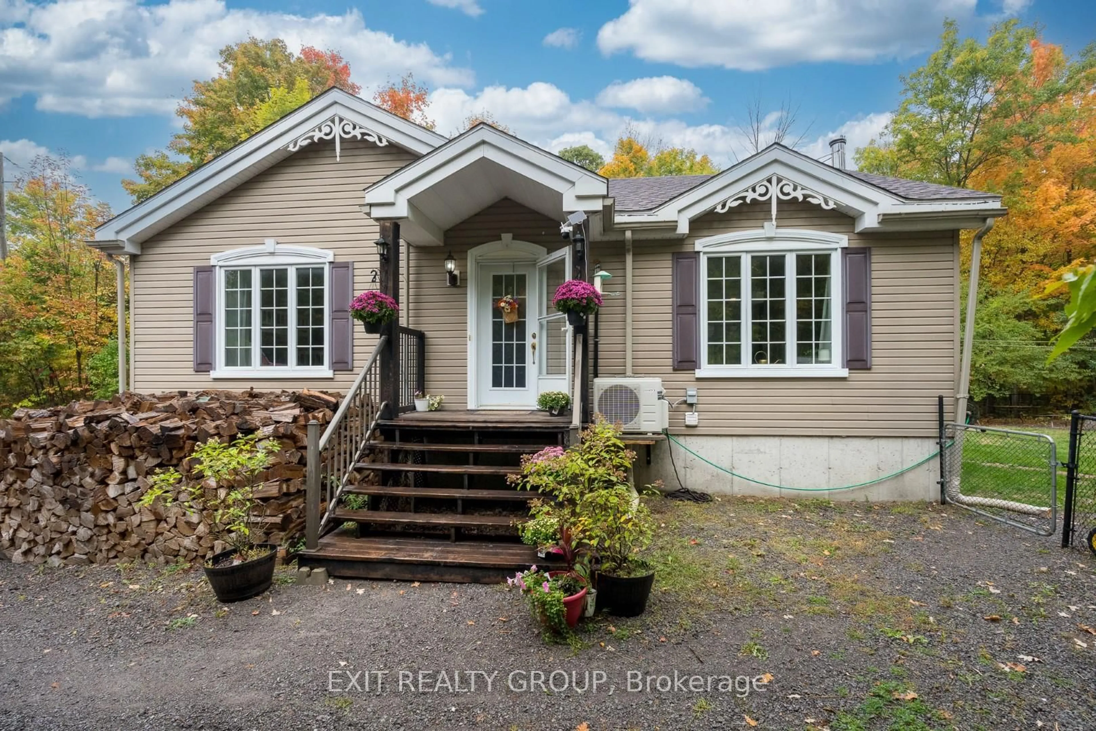 Home with vinyl exterior material, street for 143 Douglas Rd, Madoc Ontario K0K 2K0