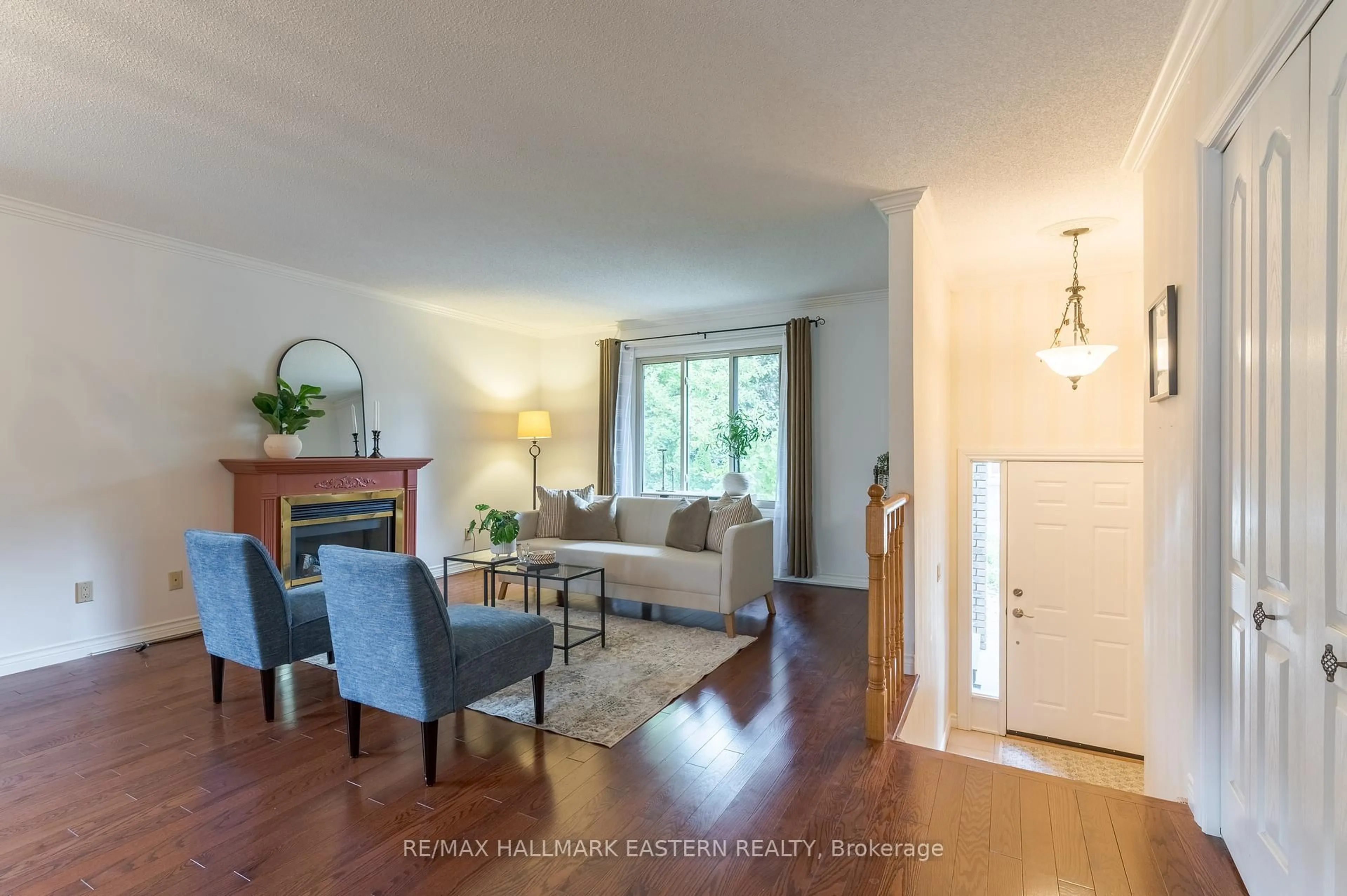 Living room with furniture, wood/laminate floor for 2196 Lorraine Dr, Peterborough Ontario K9L 1X5
