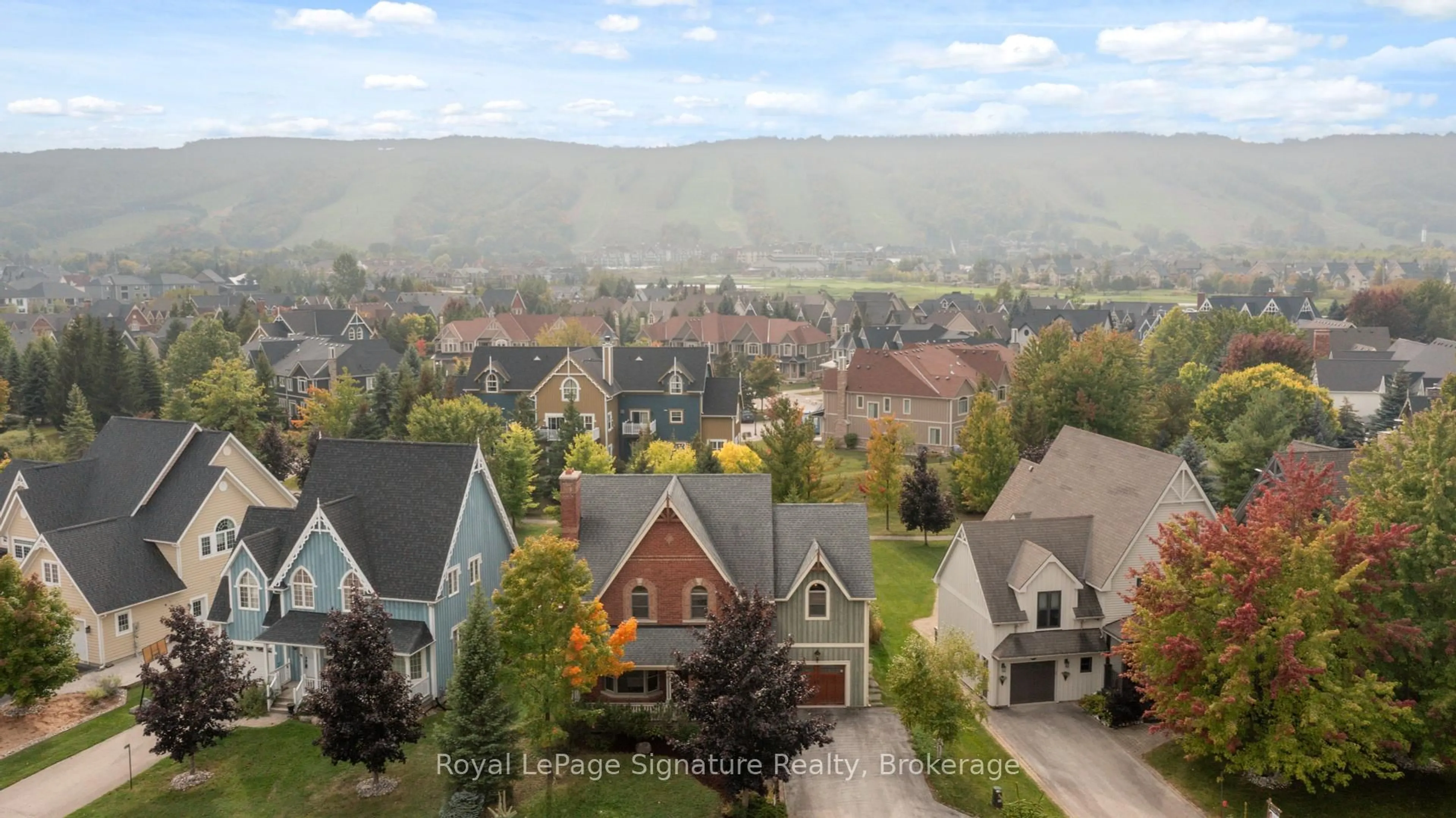 A pic from outside/outdoor area/front of a property/back of a property/a pic from drone, mountain view for 161 Snowbridge Way, Blue Mountains Ontario L9Y 0V1