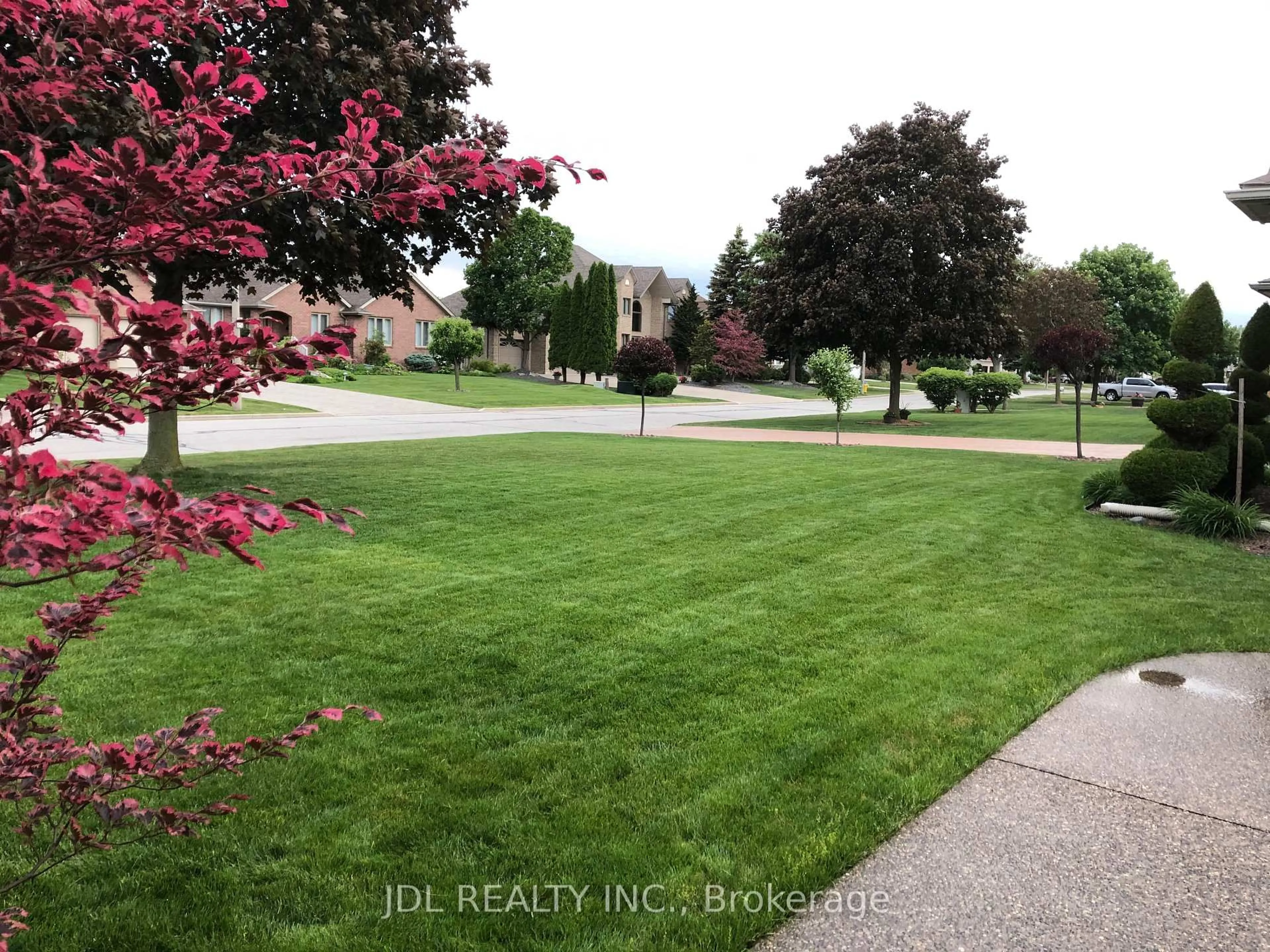 A pic from outside/outdoor area/front of a property/back of a property/a pic from drone, street for 12356 Charlene Lane, Tecumseh Ontario N9K 1B1