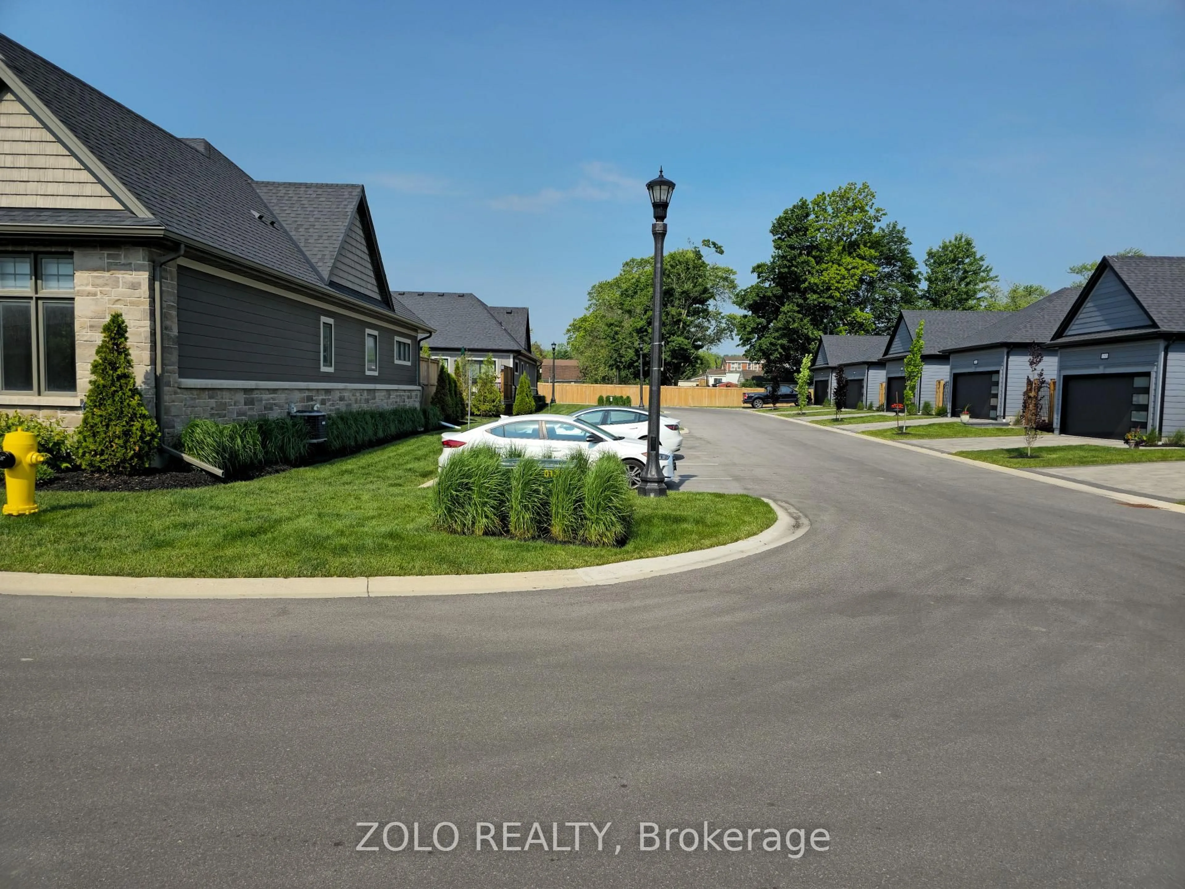 A pic from outside/outdoor area/front of a property/back of a property/a pic from drone, street for 154 Port Robinson Rd #82, Pelham Ontario L0S 1E6