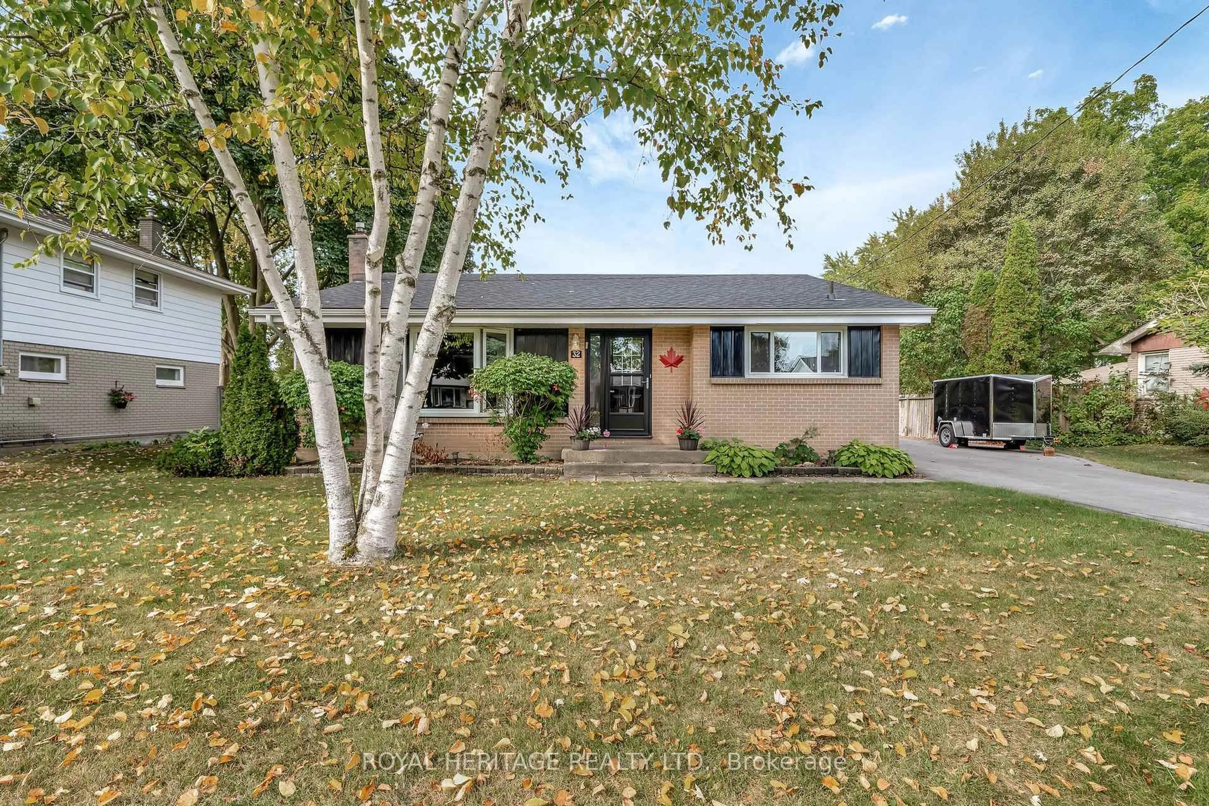 Home with brick exterior material, street for 32 Glen Rd, Belleville Ontario K8P 4G1