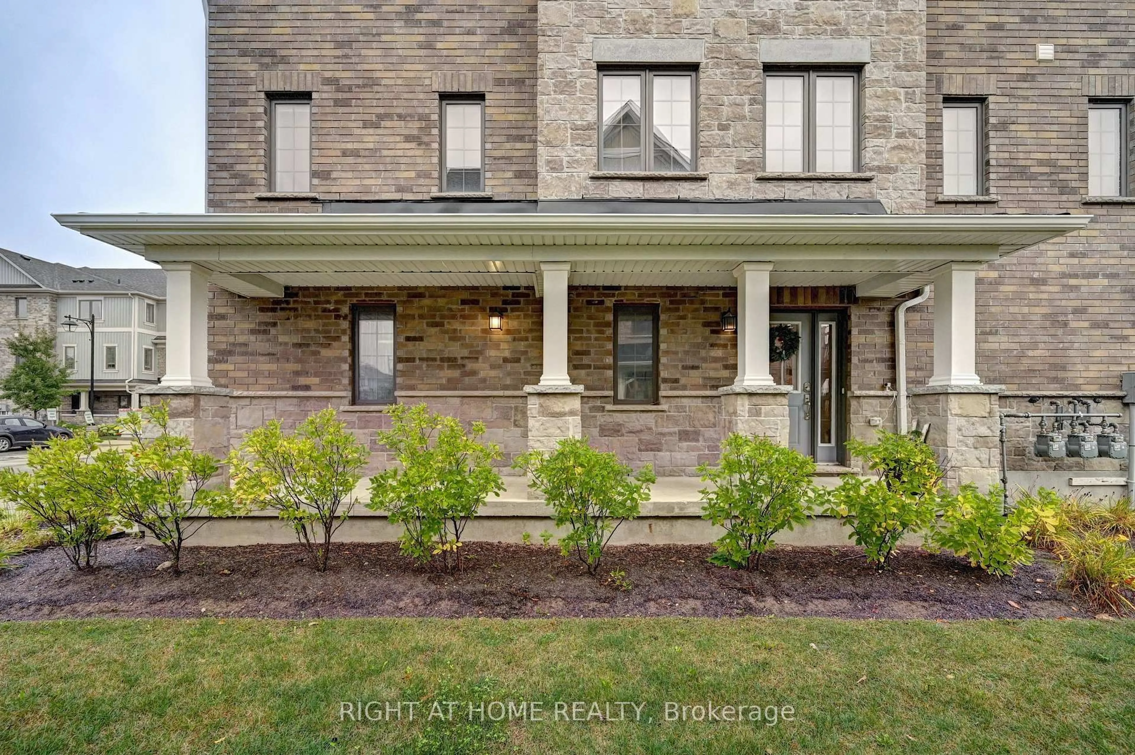 Home with brick exterior material, street for 14 Bank Swallow Cres, Kitchener Ontario N2P 0J7