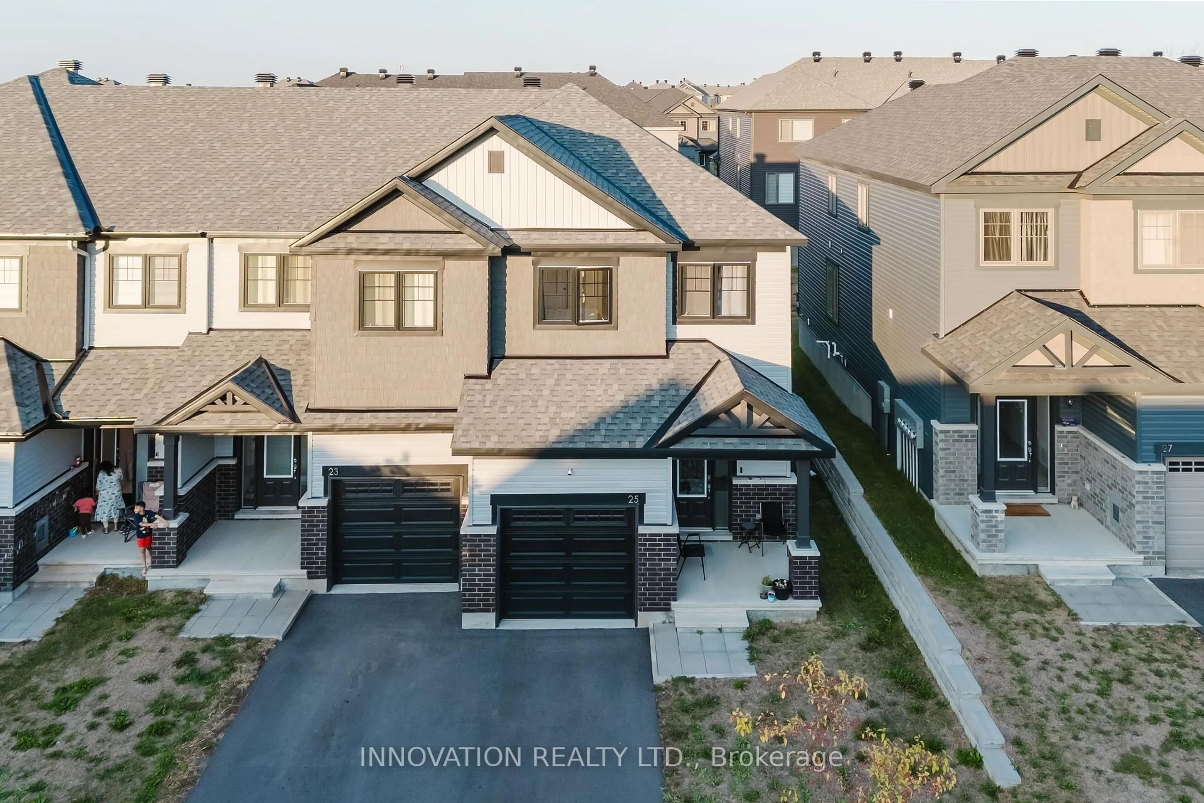 A pic from outside/outdoor area/front of a property/back of a property/a pic from drone, unknown for 25 Atop Lane, Ottawa Ontario K1X 1G6