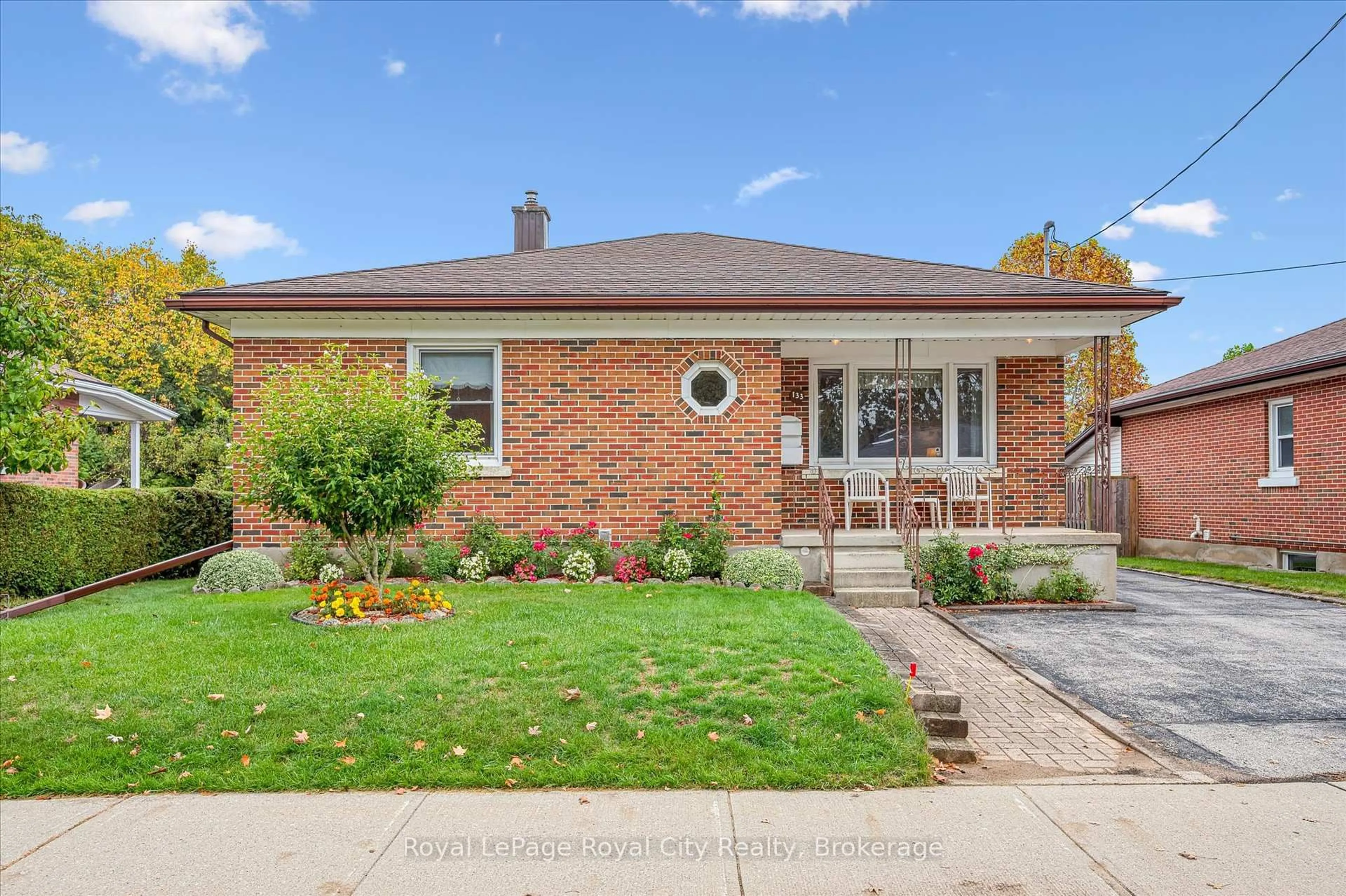 Home with brick exterior material, street for 133 Emma St, Guelph Ontario N1E 1V2