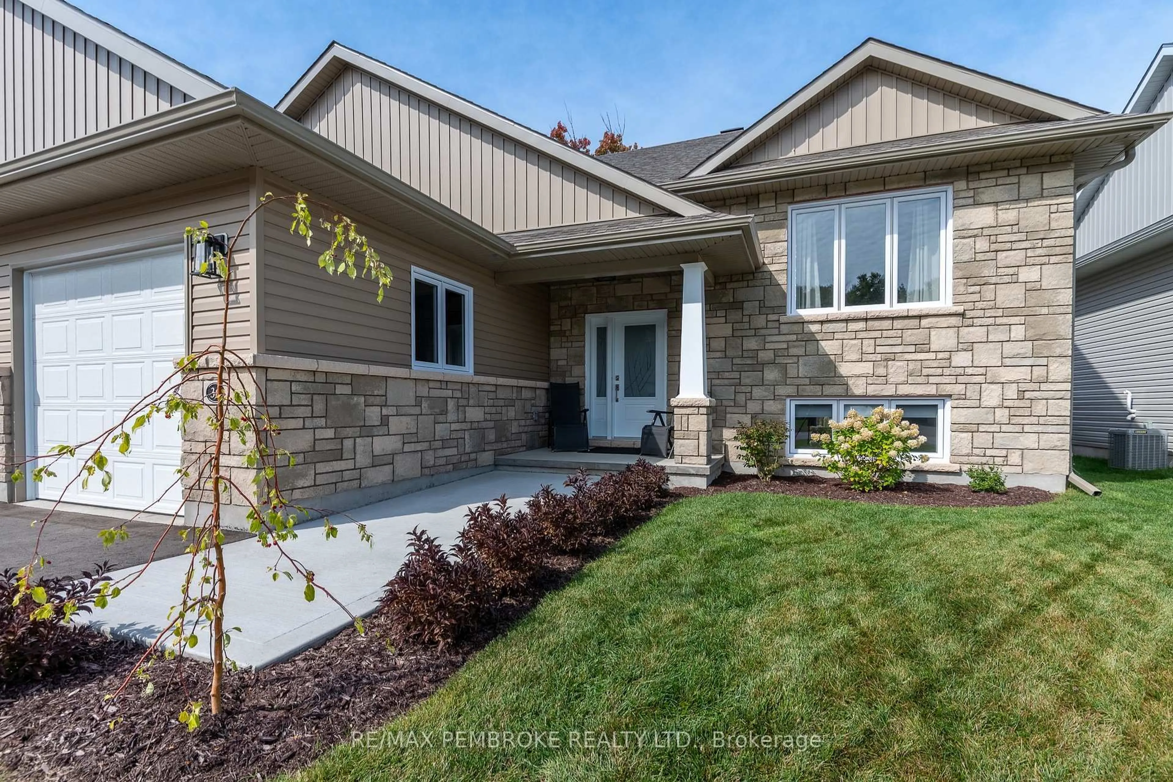 Home with brick exterior material, street for 36 Zachary St, Petawawa Ontario K8H 0G5