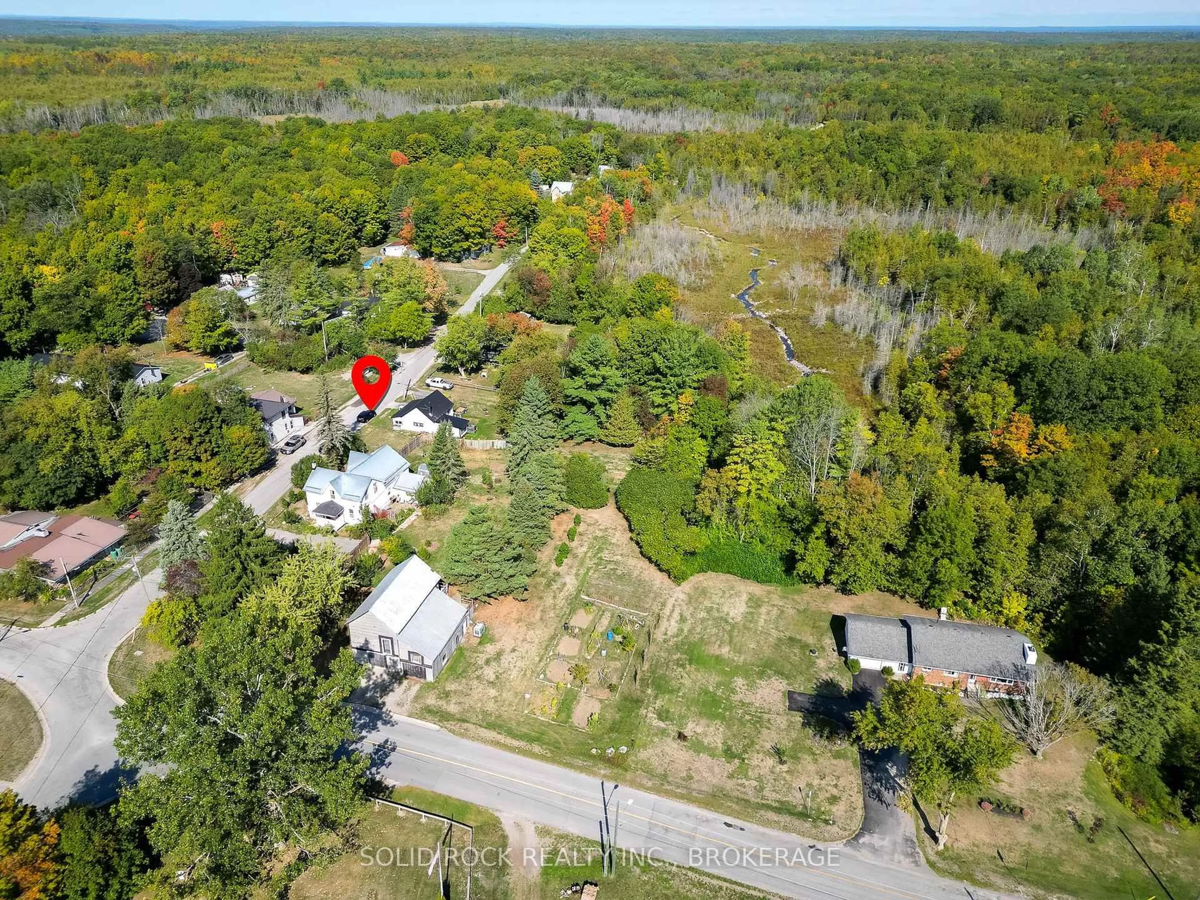 A pic from outside/outdoor area/front of a property/back of a property/a pic from drone, forest/trees view for 108 Queen St, Tweed Ontario K0L 2L0