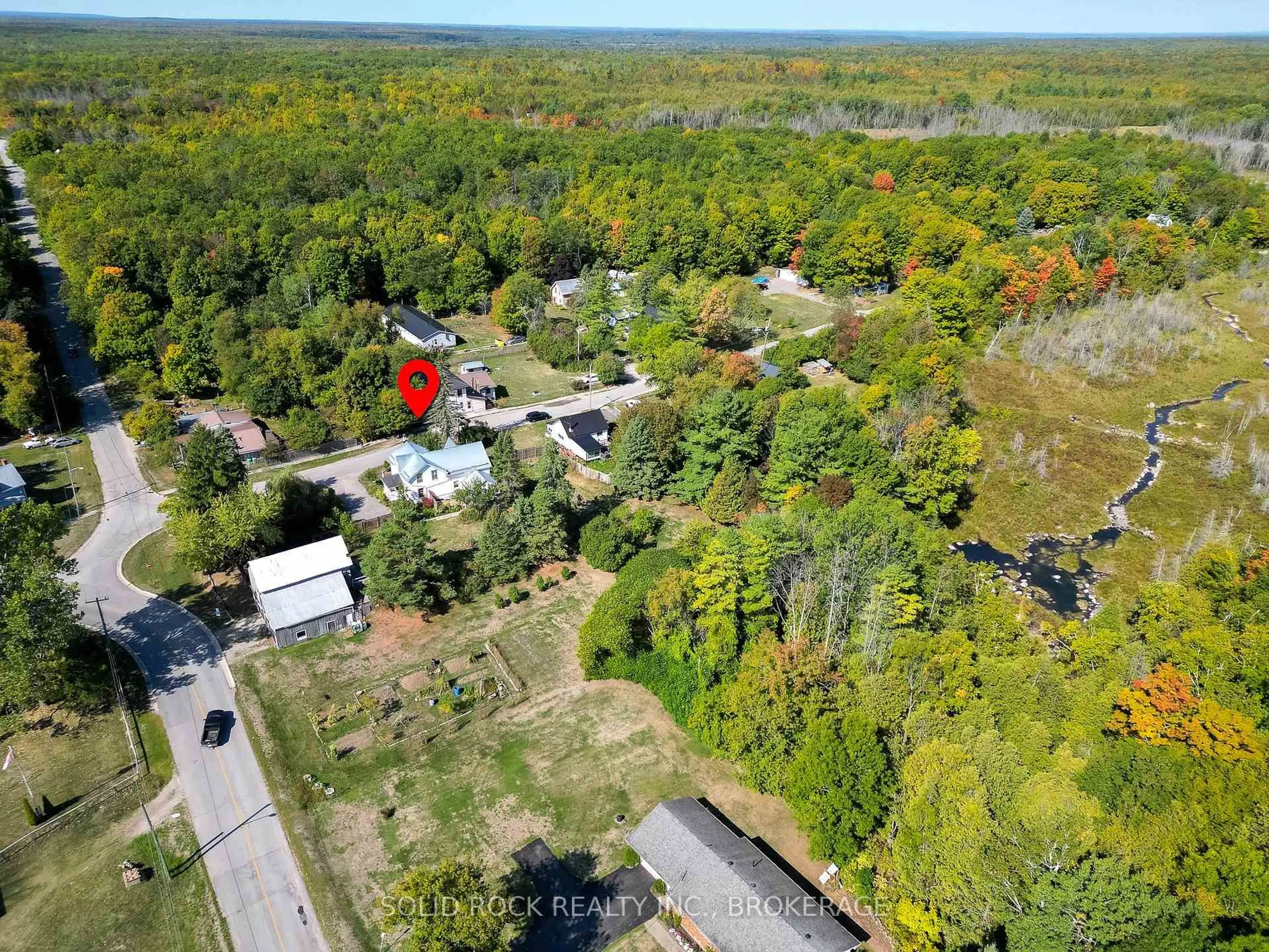 A pic from outside/outdoor area/front of a property/back of a property/a pic from drone, forest/trees view for 108 Queen St, Tweed Ontario K0L 2L0