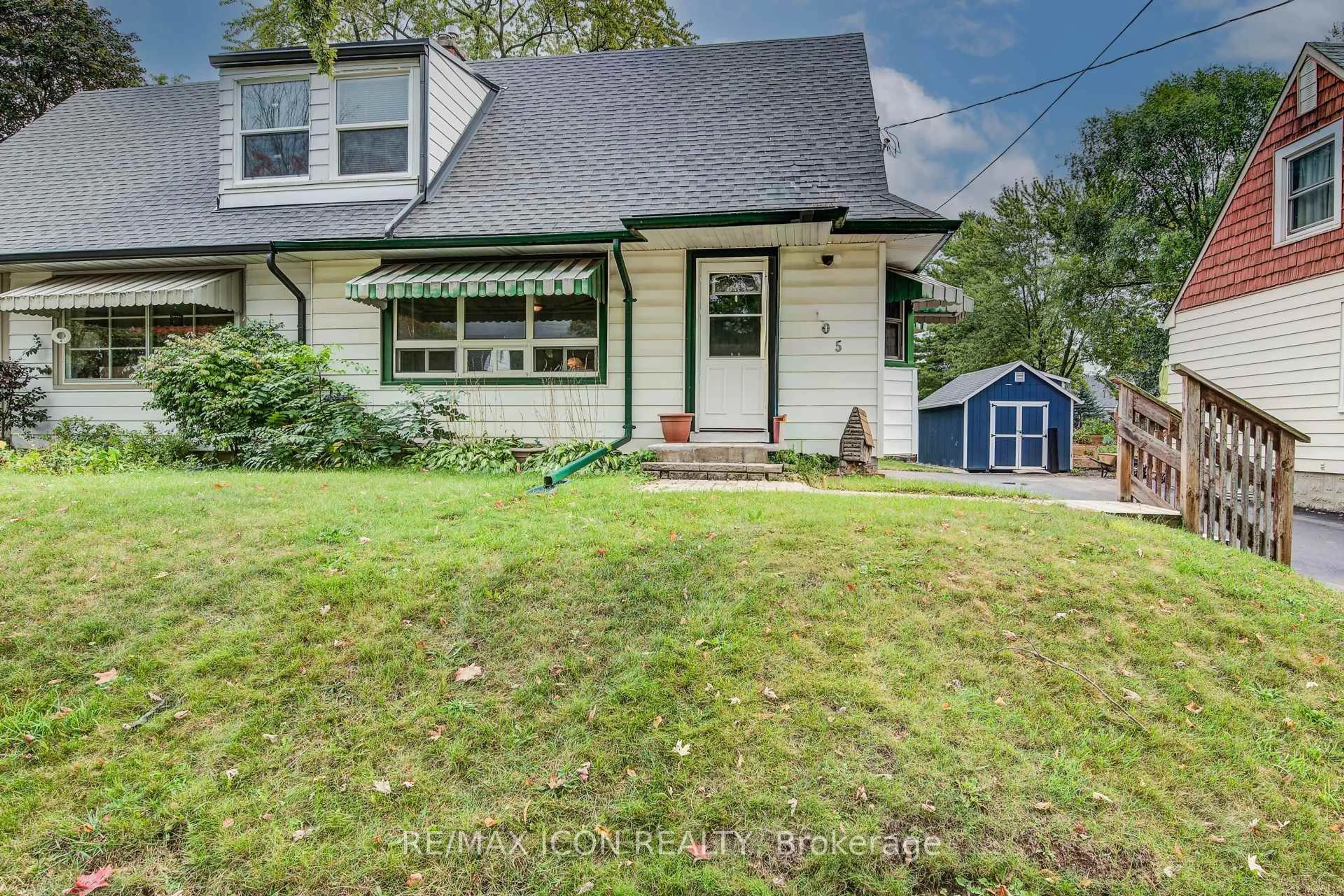 Home with vinyl exterior material, street for 105 Lorne Cres, Kitchener Ontario N2M 3Y4
