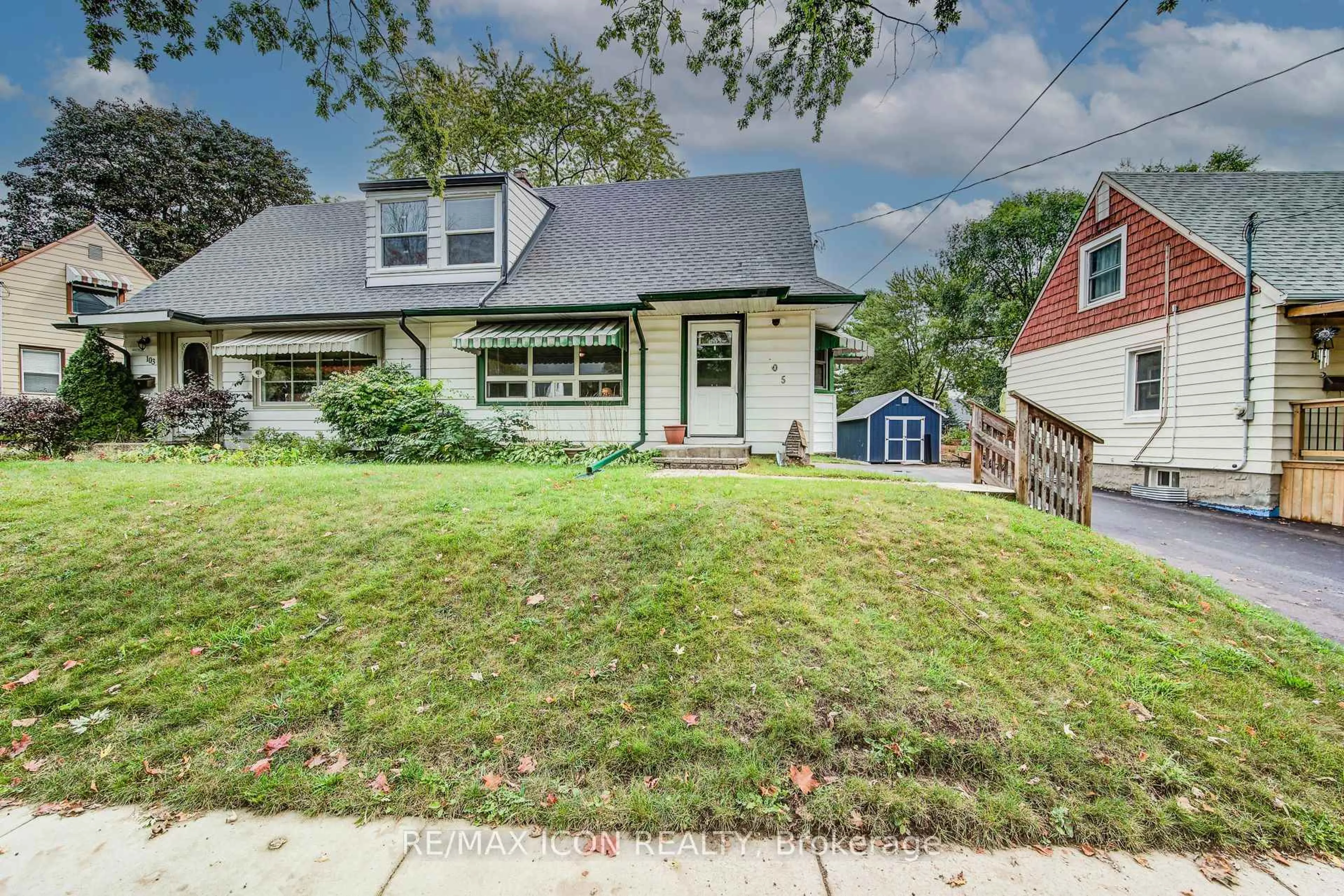Home with vinyl exterior material, street for 105 Lorne Cres, Kitchener Ontario N2M 3Y4