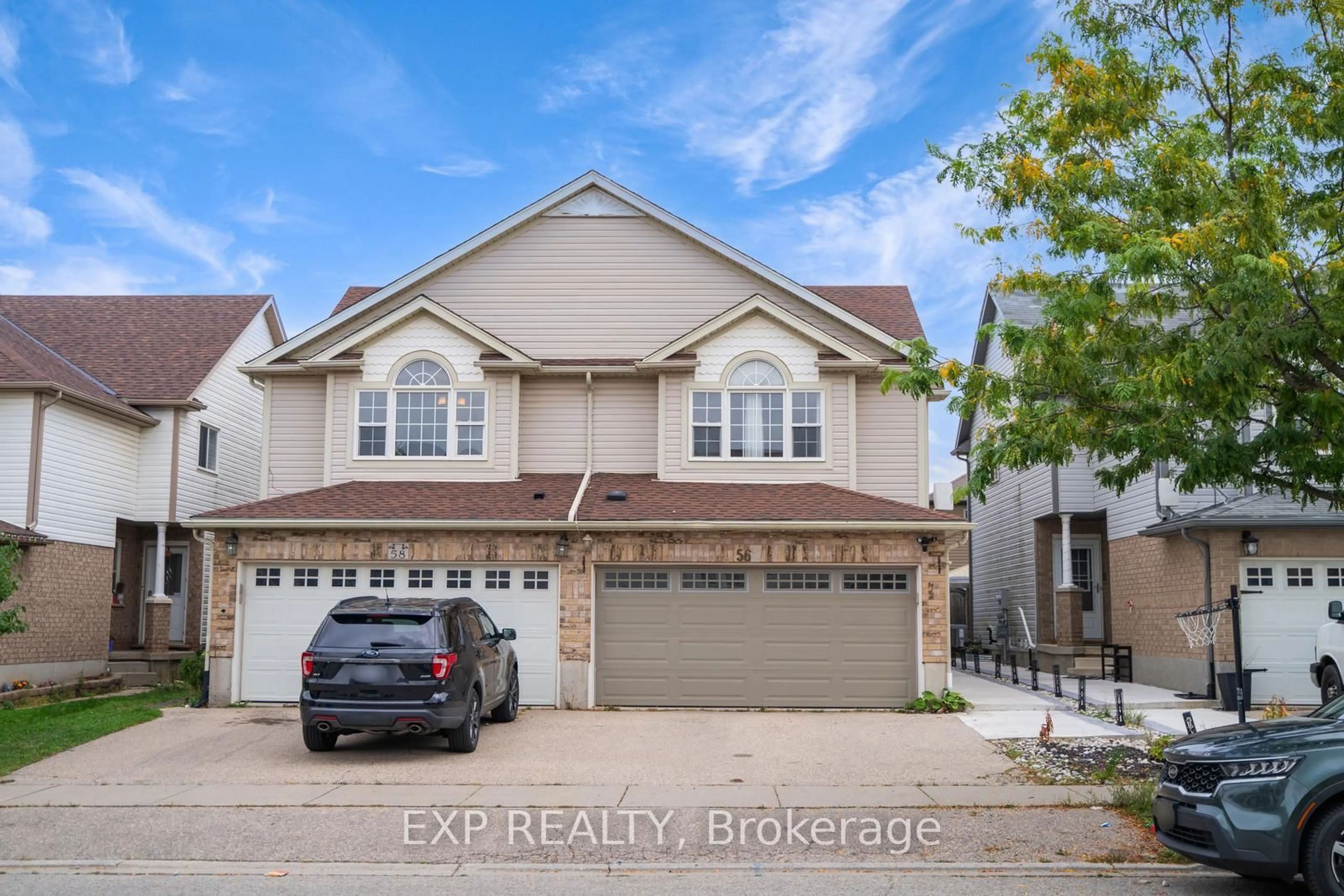 A pic from outside/outdoor area/front of a property/back of a property/a pic from drone, street for 56 Verona St, Kitchener Ontario N2R 1T9