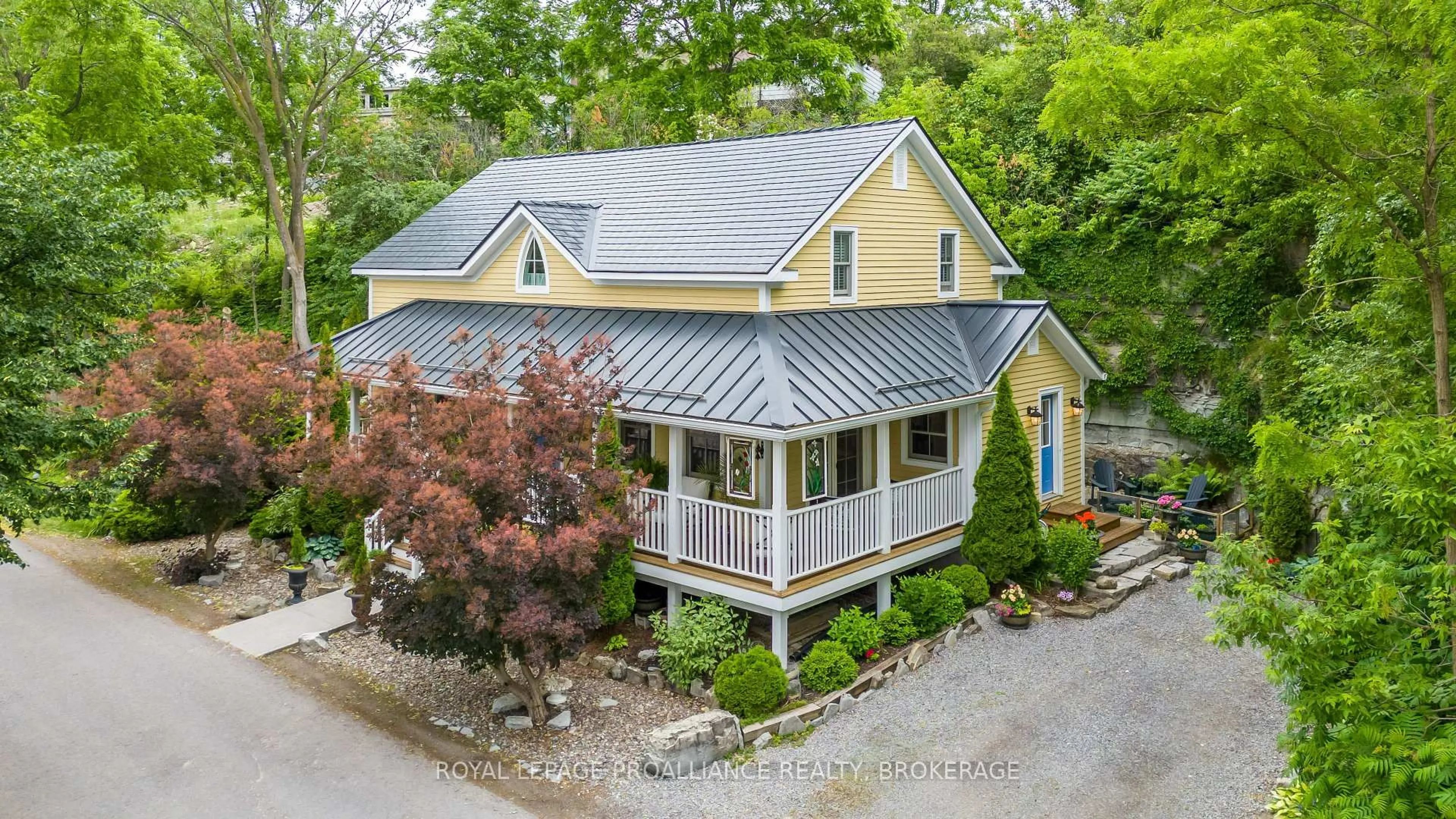A pic from outside/outdoor area/front of a property/back of a property/a pic from drone, street for 222 Green Bay Rd, Kingston Ontario K7K 7C4