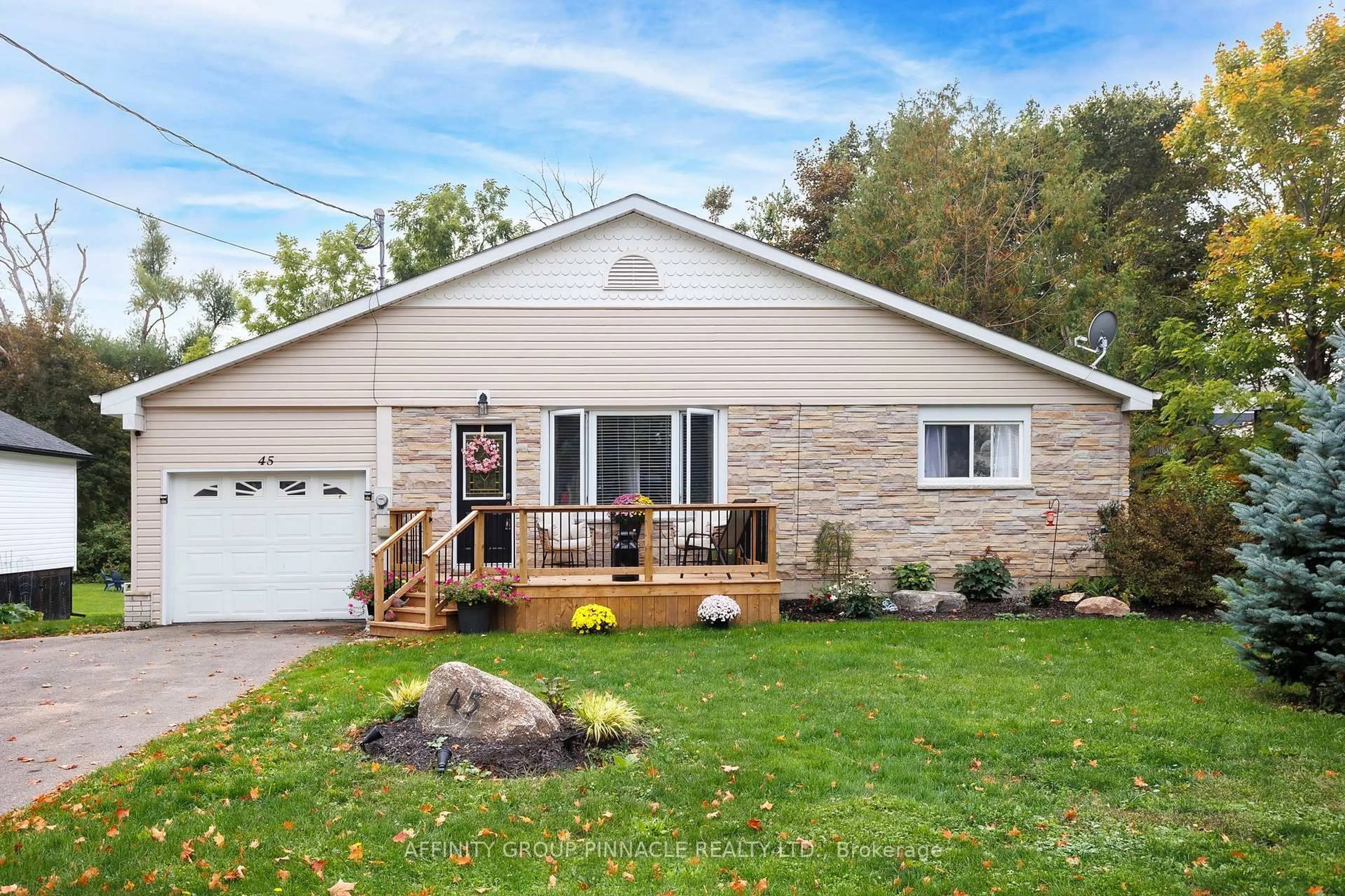 Home with vinyl exterior material, street for 45 Queen St, Kawartha Lakes Ontario K0M 1N0
