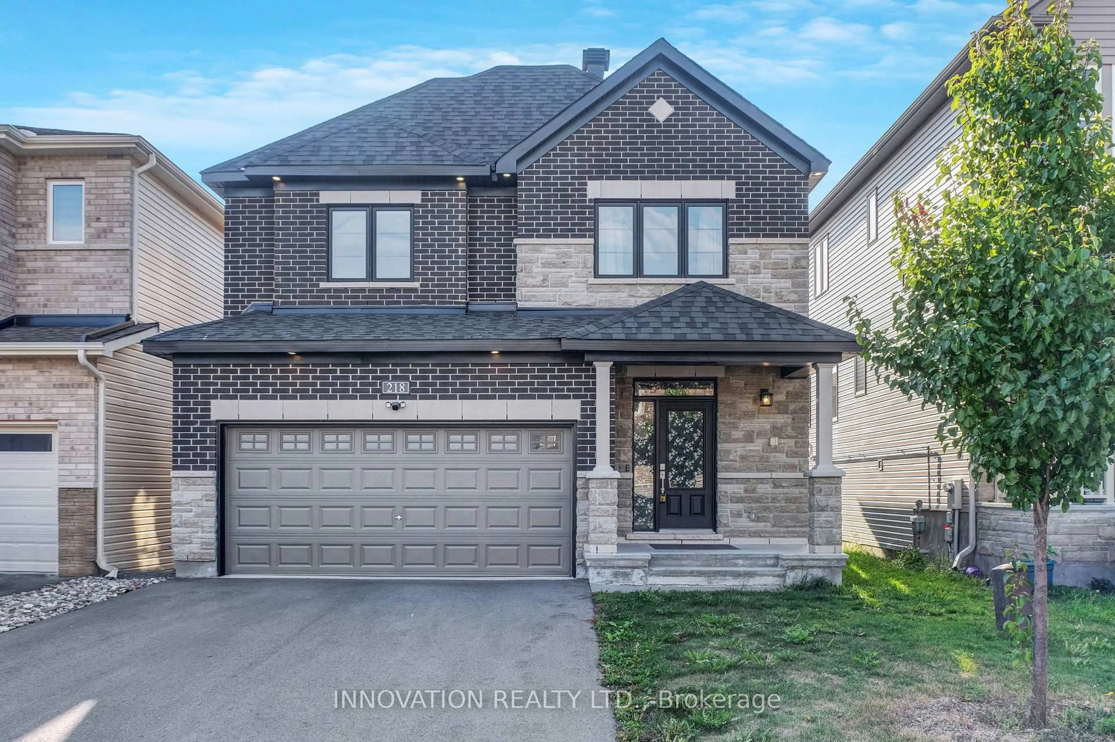 Home with brick exterior material, street for 218 Calvington Ave, Ottawa Ontario K2T 0P8