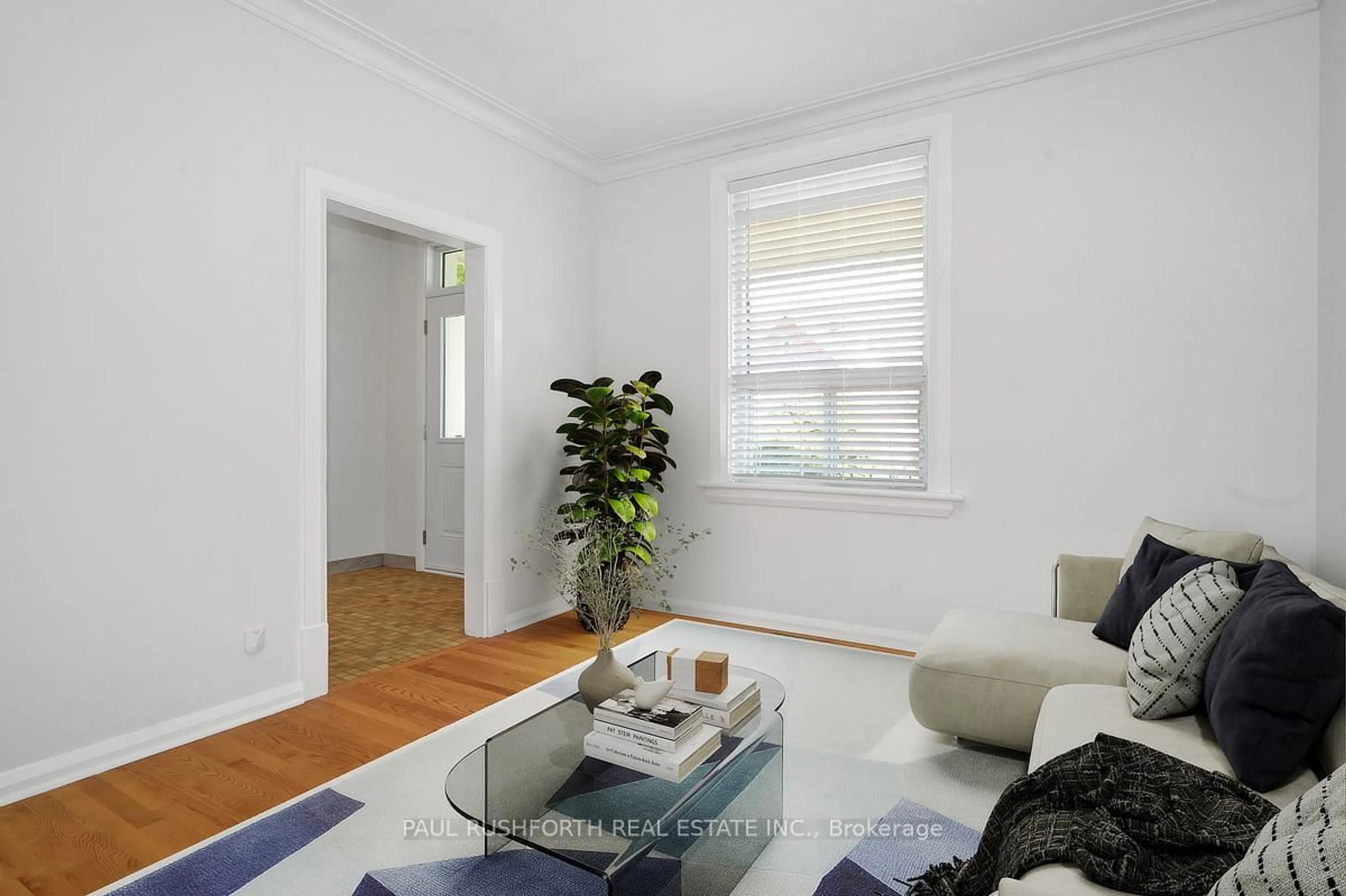 Living room with furniture, wood/laminate floor for 36 Champagne Ave, Ottawa Ontario K1S 4P2