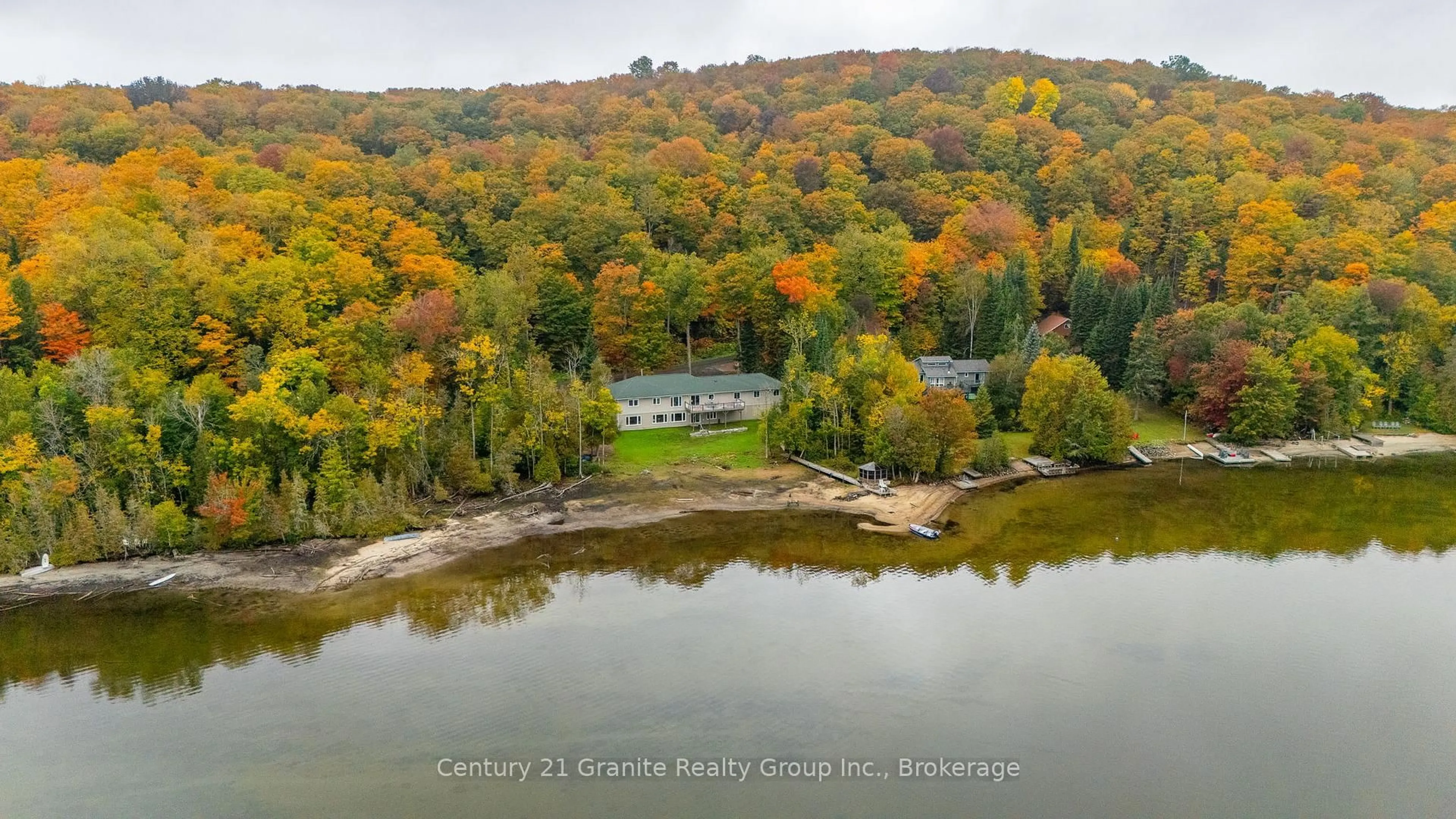A pic from outside/outdoor area/front of a property/back of a property/a pic from drone, water/lake/river/ocean view for 1246 Grace River Rd, Dysart et al Ontario K0L 1M1