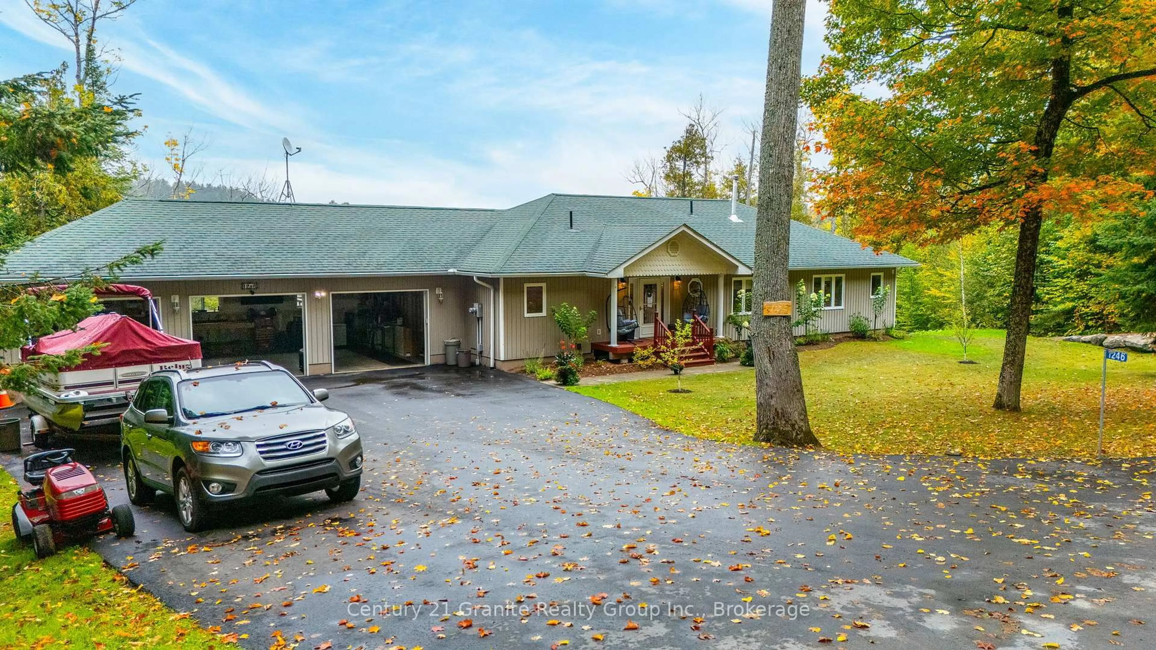 A pic from outside/outdoor area/front of a property/back of a property/a pic from drone, street for 1246 Grace River Rd, Dysart et al Ontario K0L 1M1