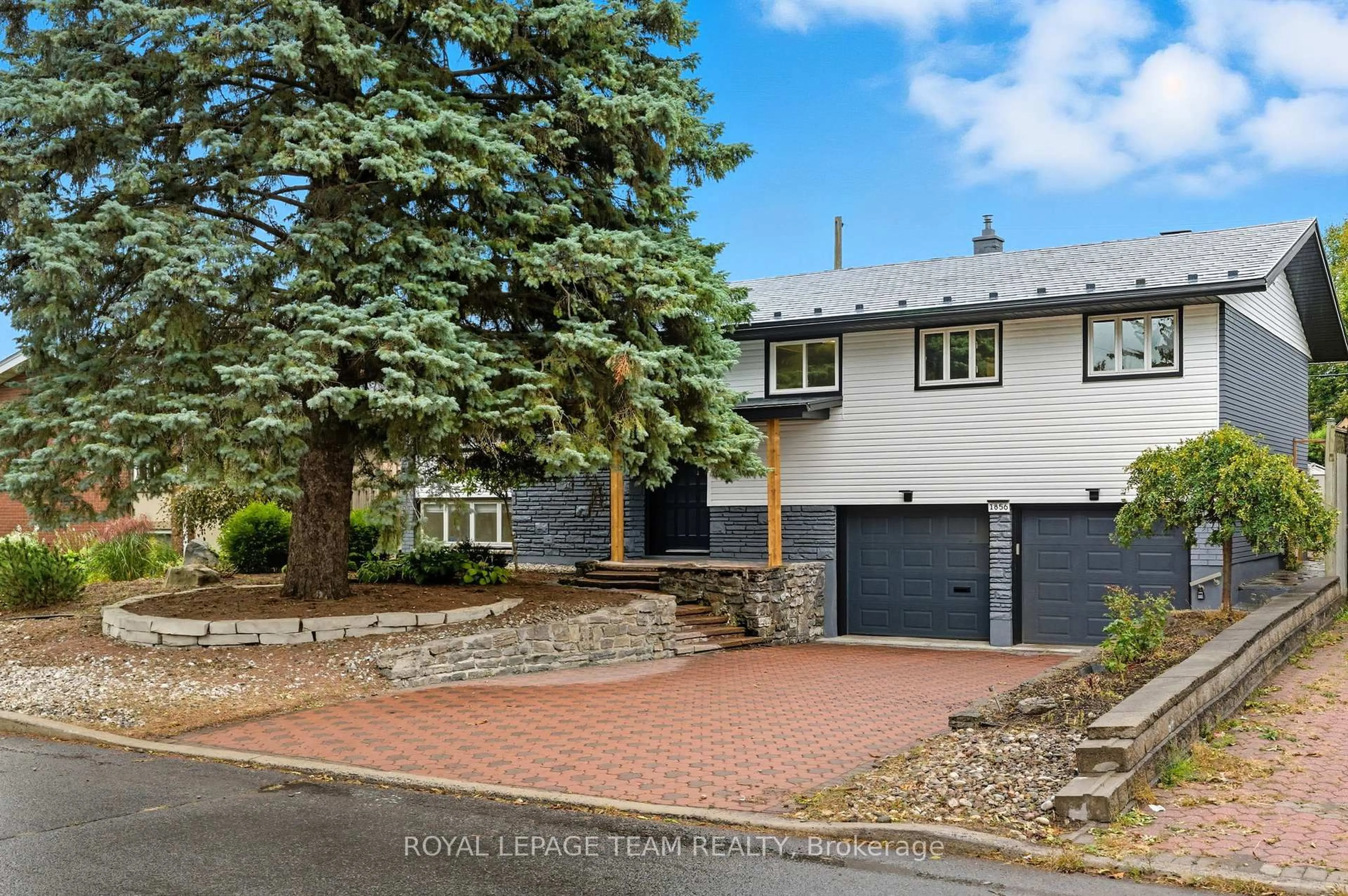 Home with brick exterior material, street for 1856 Playfair Dr, Ottawa Ontario K1H 5S1