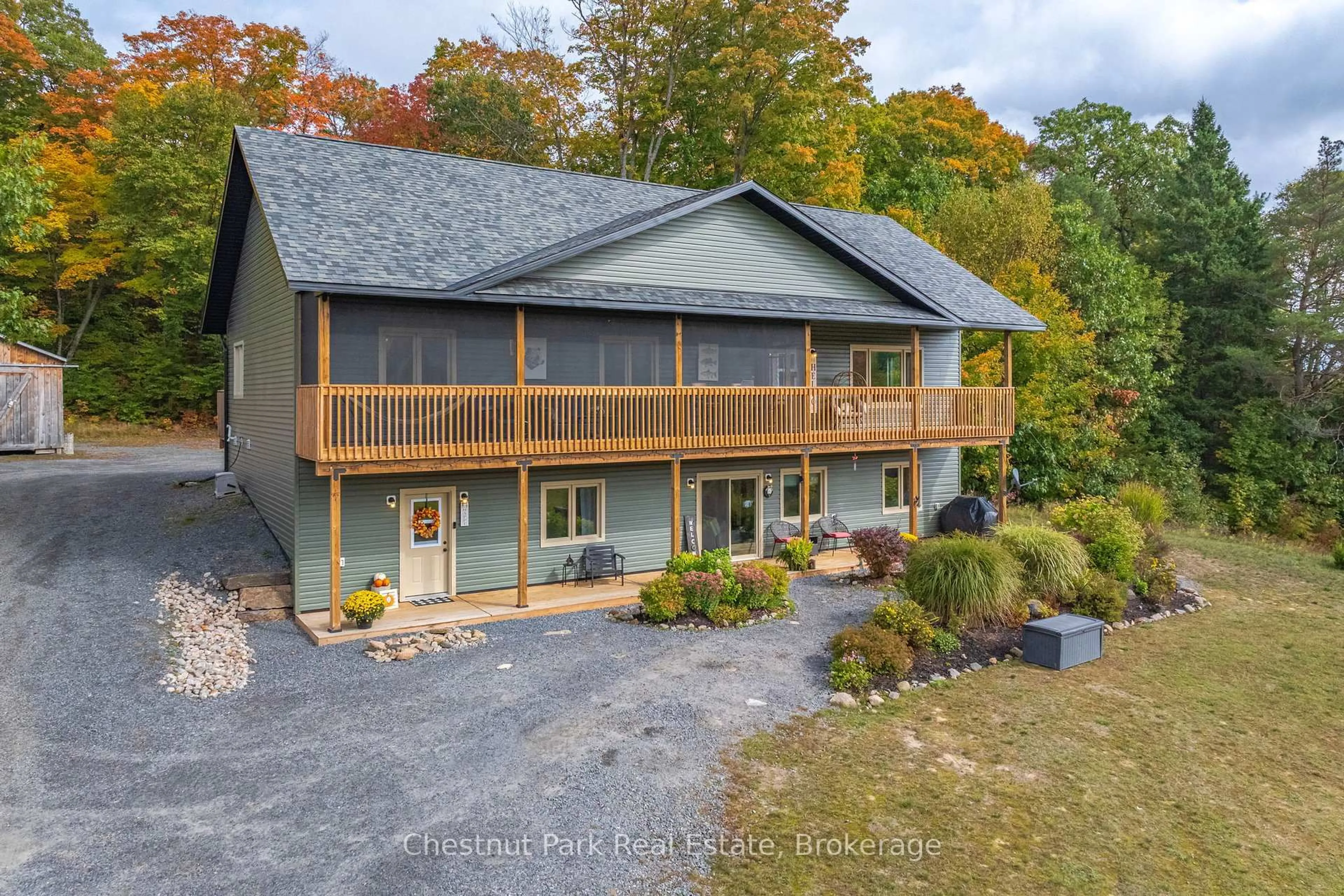 A pic from outside/outdoor area/front of a property/back of a property/a pic from drone, water/lake/river/ocean view for 1545 Etwell Rd, Huntsville Ontario P1H 2J2