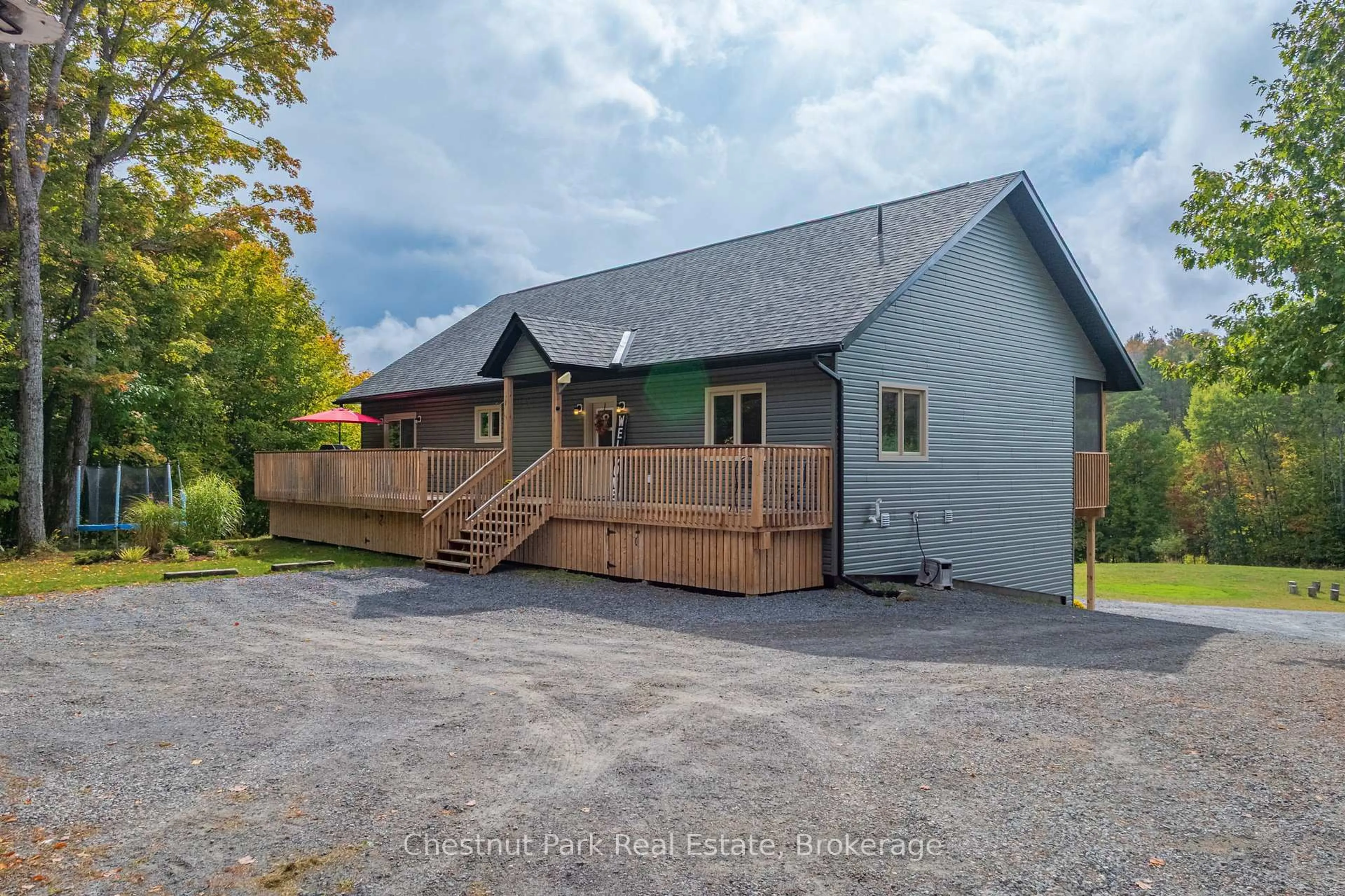 A pic from outside/outdoor area/front of a property/back of a property/a pic from drone, mountain view for 1545 Etwell Rd, Huntsville Ontario P1H 2J2