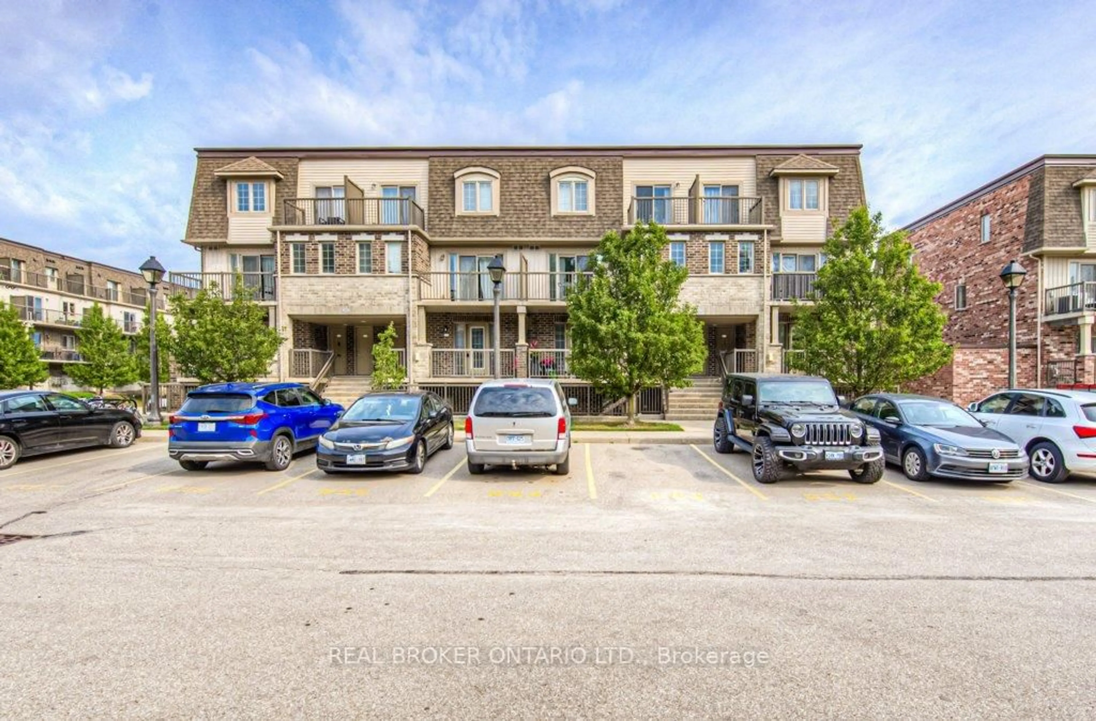 A pic from outside/outdoor area/front of a property/back of a property/a pic from drone, street for 240 Rachel Cres #F, Kitchener Ontario N2R 0E1