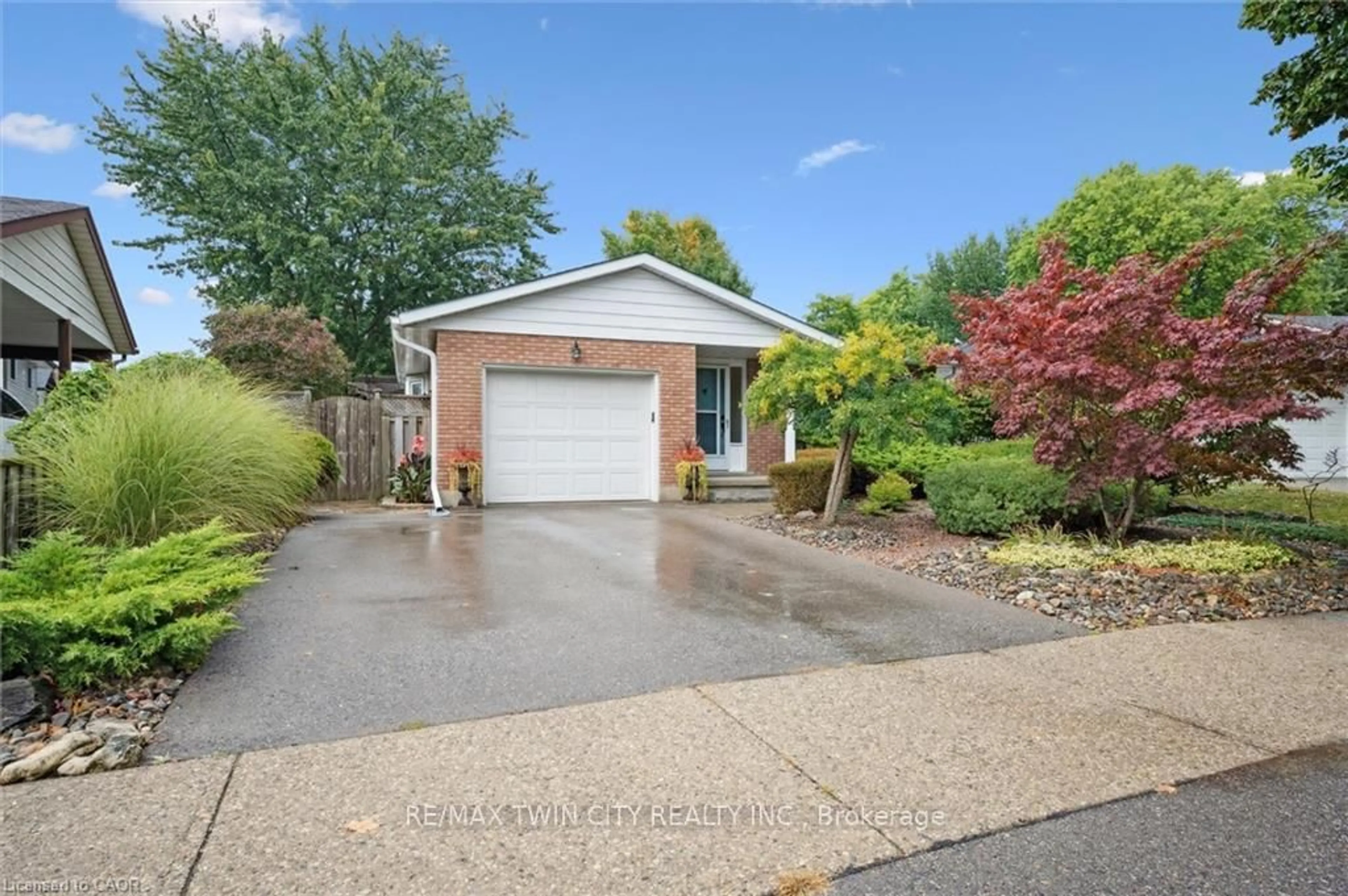 Home with brick exterior material, street for 210 Foxhunt Rd, Waterloo Ontario N2K 2S2