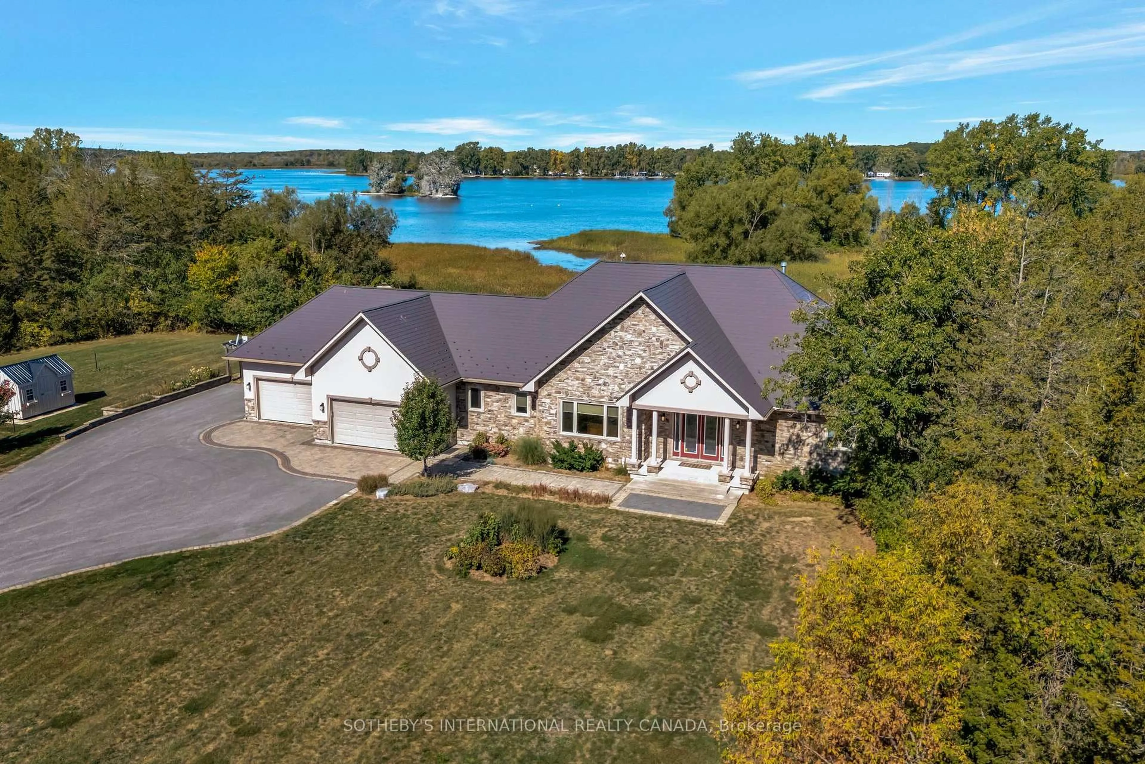 A pic from outside/outdoor area/front of a property/back of a property/a pic from drone, water/lake/river/ocean view for 2691 County 15 Rd, Prince Edward County Ontario K0K 2T0