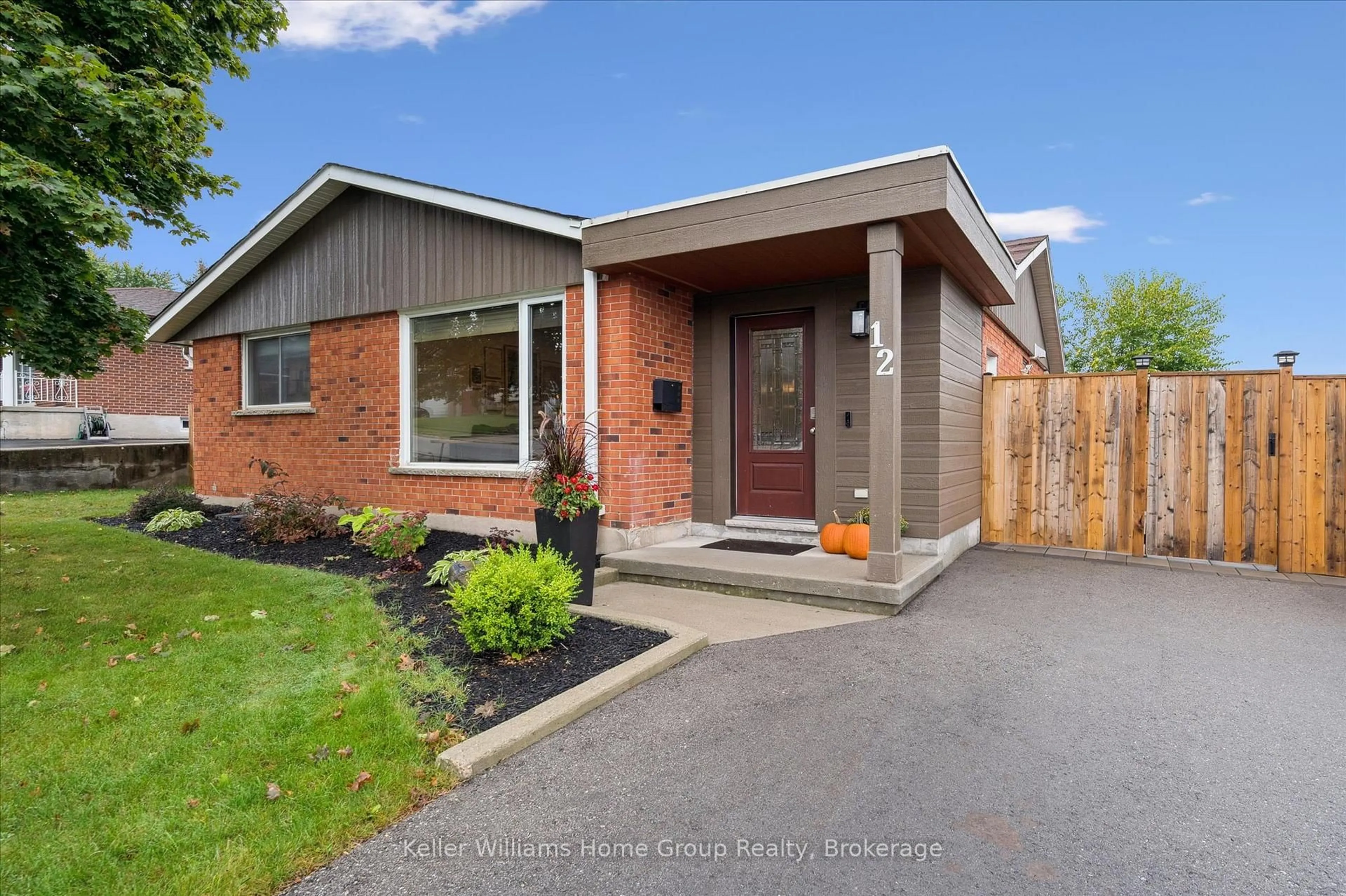 Home with brick exterior material, street for 12 Greenbrier Rd, Cambridge Ontario N1R 6M9